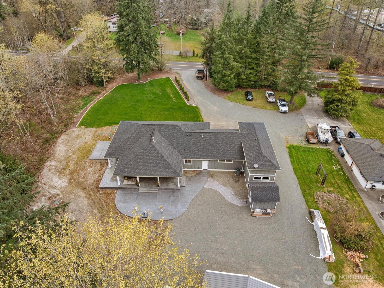 20025 Southeast 232nd Street Maple Valley, WA 98038 - Photo 40 of 40 an aerial view of a house with a yard and lake view