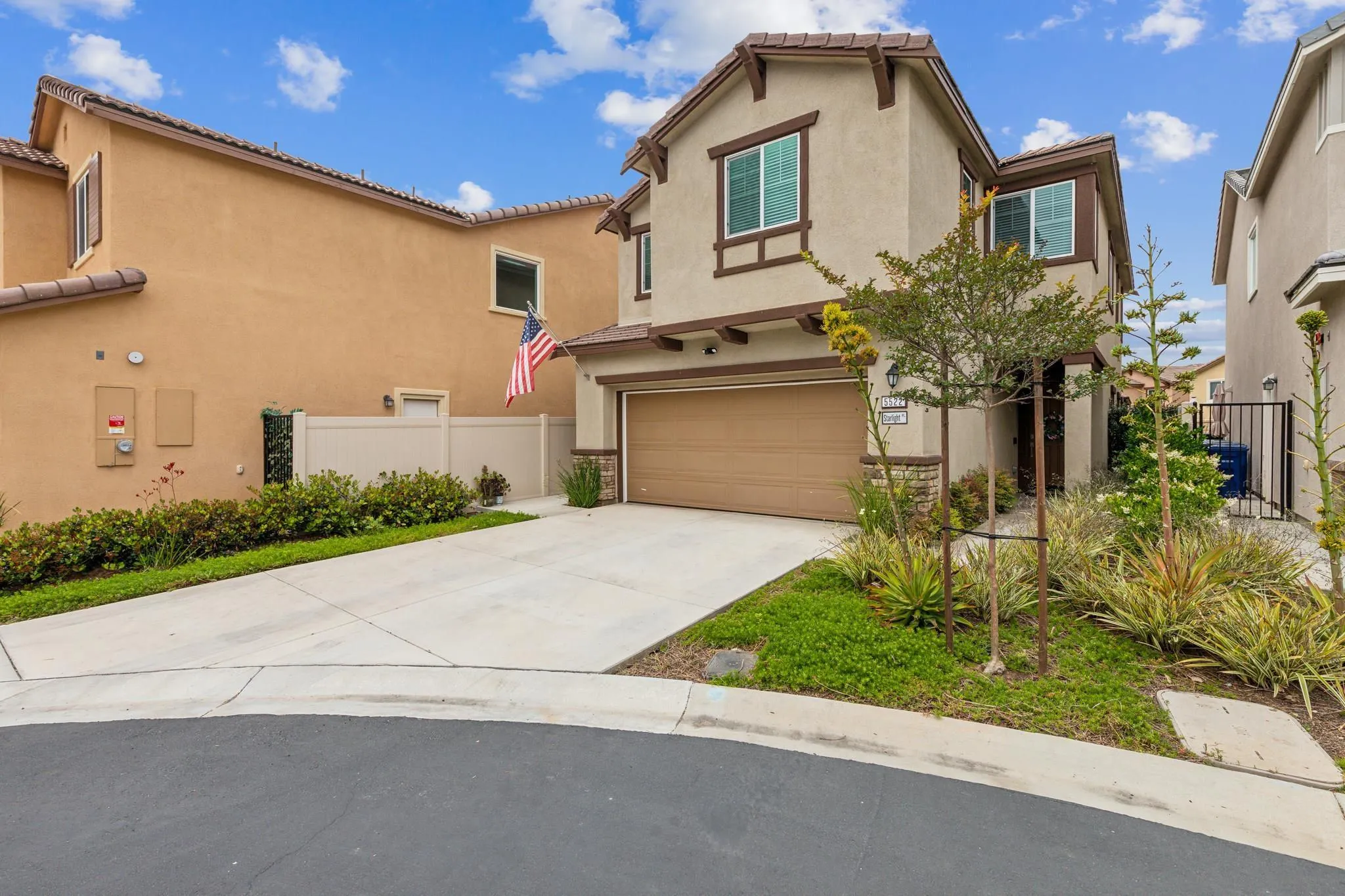 5522 Starlight Place Bonsall, CA 92003 - Photo 1 of 32 a front view of a house with a yard and trees
