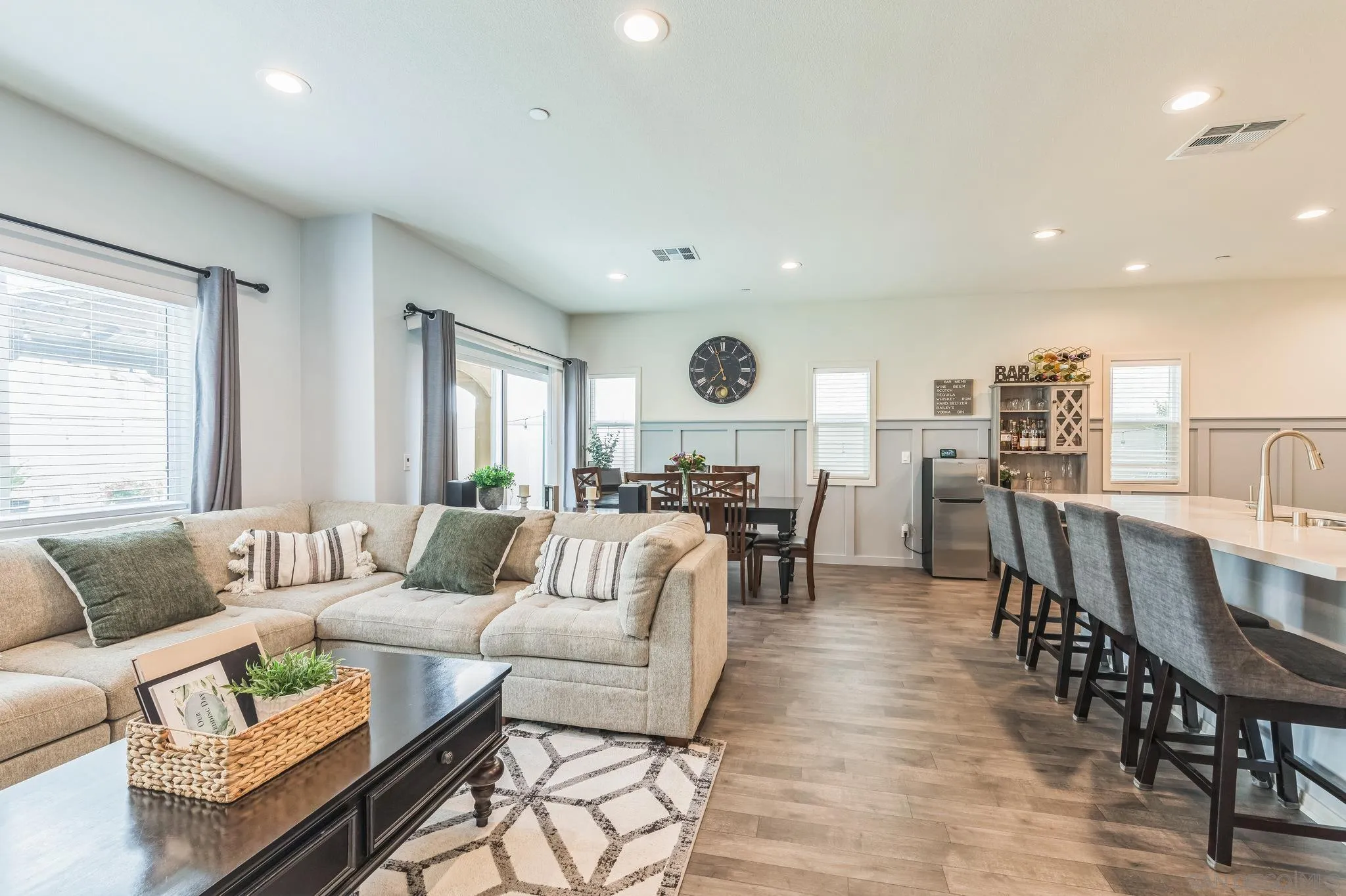 5522 Starlight Place Bonsall, CA 92003 - Photo 12 of 32 a living room with furniture and a large window