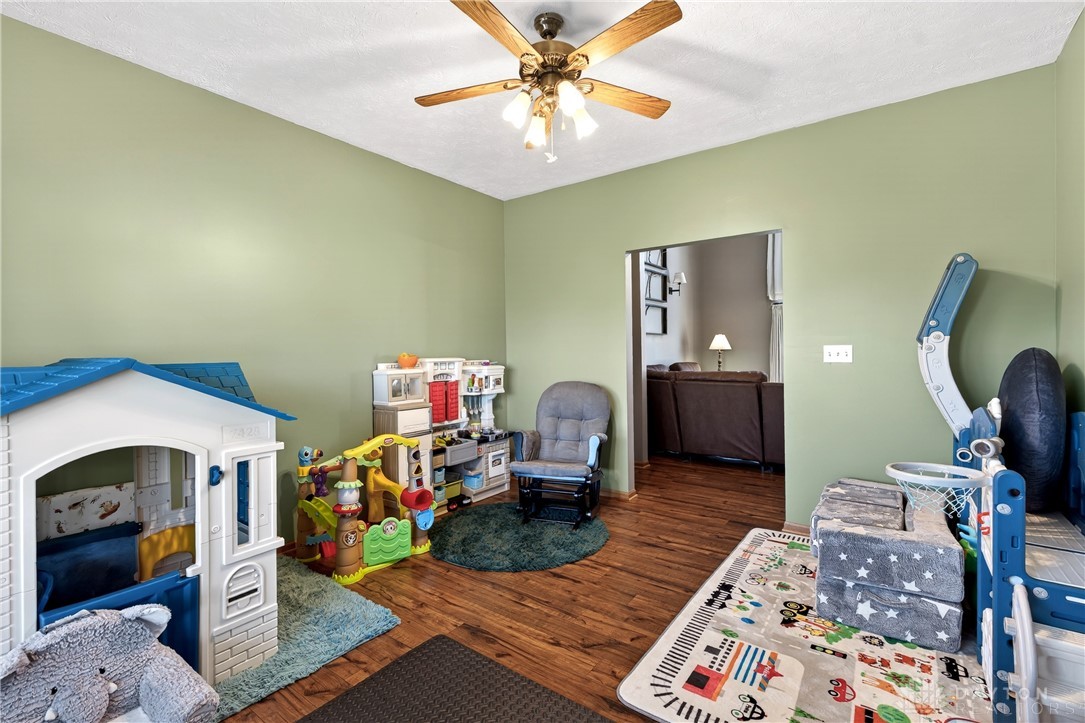 6560 Snyder Road Fletcher, OH 45326 - Photo 70 of 71 This versatile space offers durable hardwood flooring, ideal for a flexible floorplan.