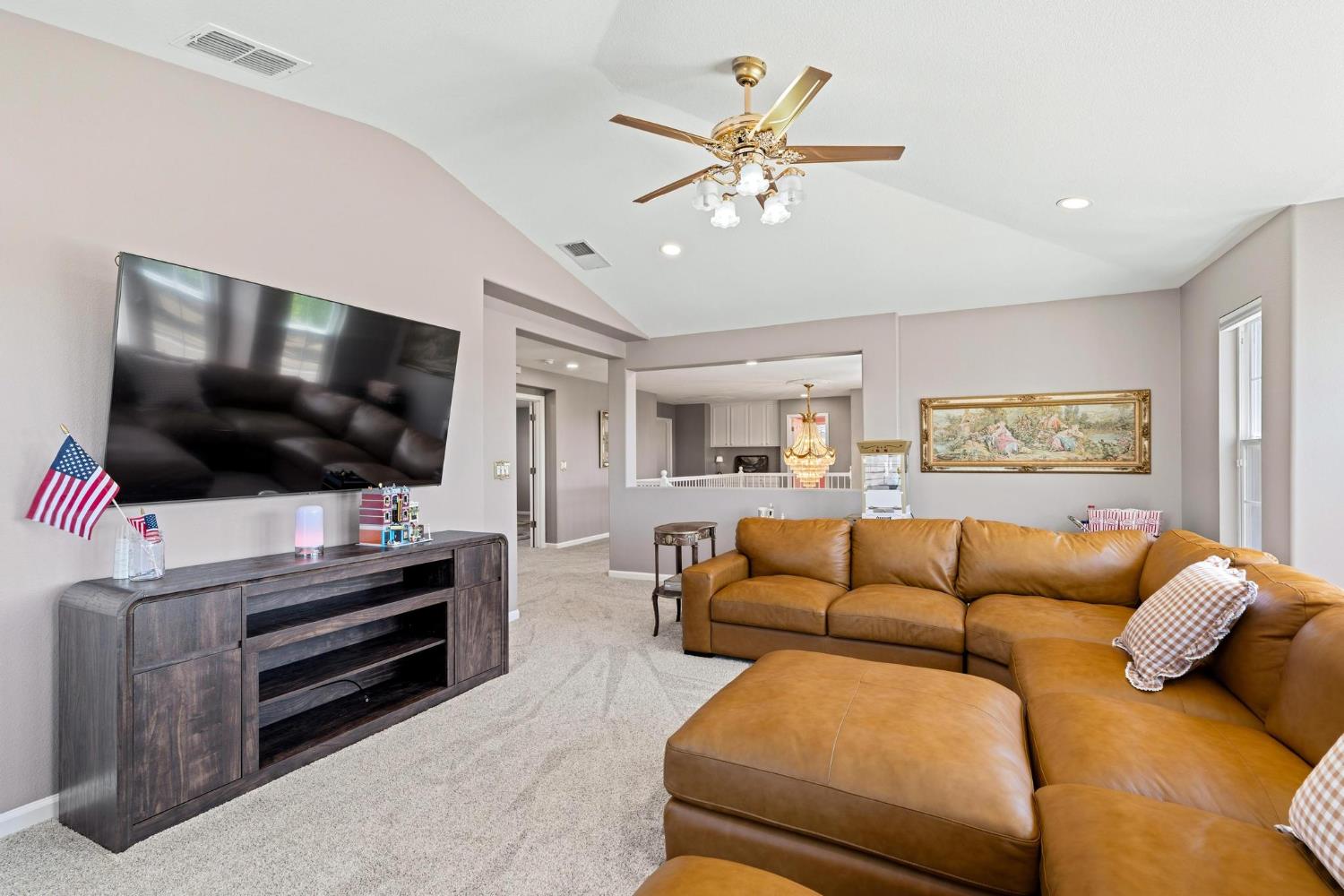 426 South Highland Avenue Ripon, CA 95366 - Photo 52 of 82 a living room with furniture and a flat screen tv