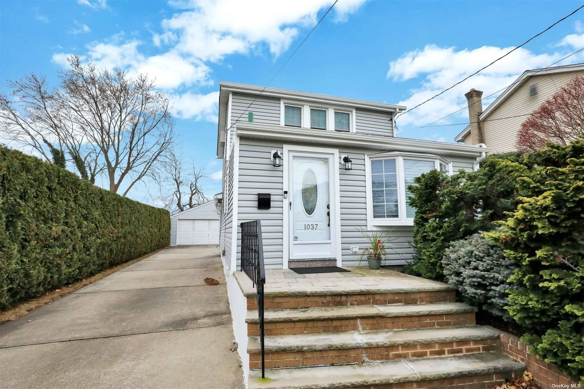 1037 Concord Street Franklin Square, NY 11010 - Photo 1 of 1 a front view of a house with a yard