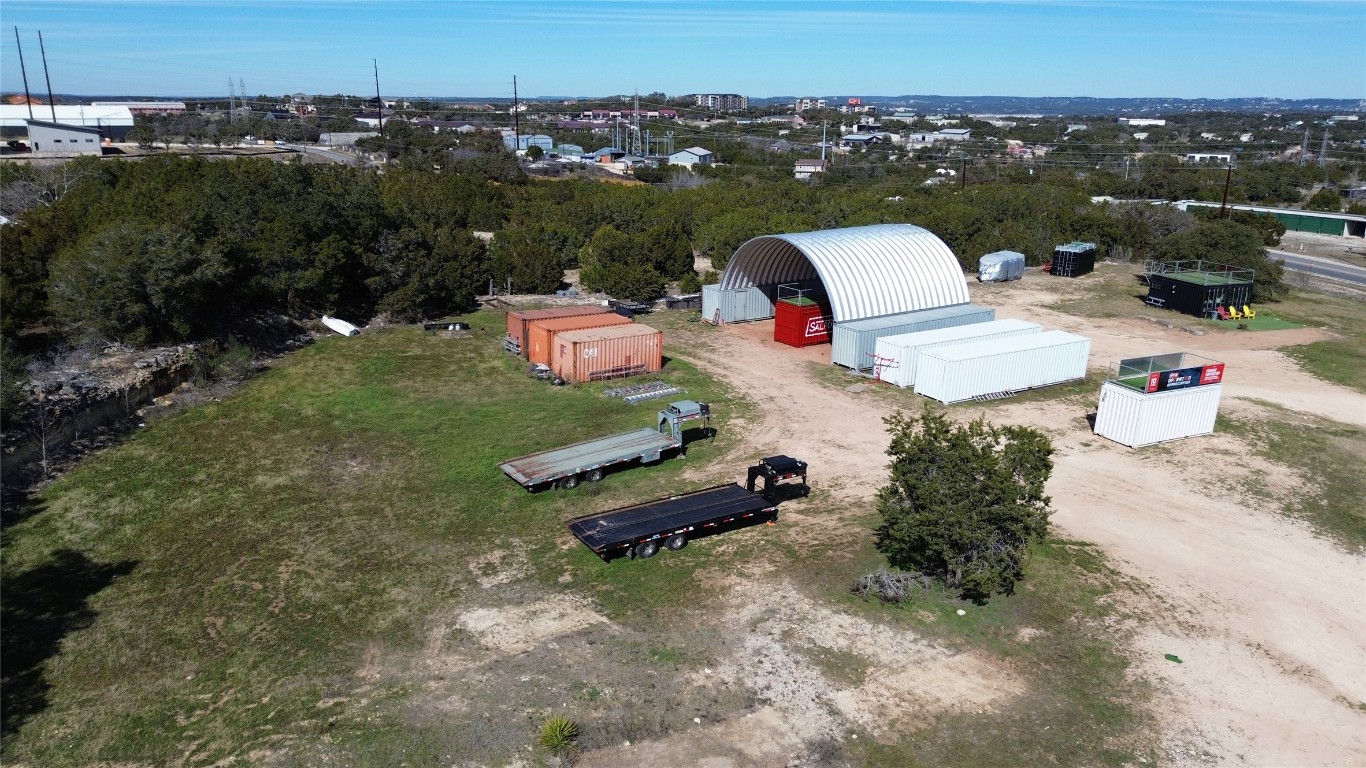 Undisclosed Address Austin, TX 78734 - Photo 6 of 8 an aerial view of a house with a yard