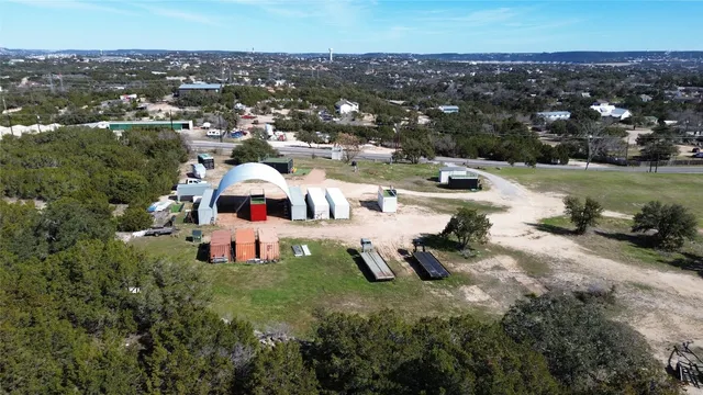 a view of a street with a yard