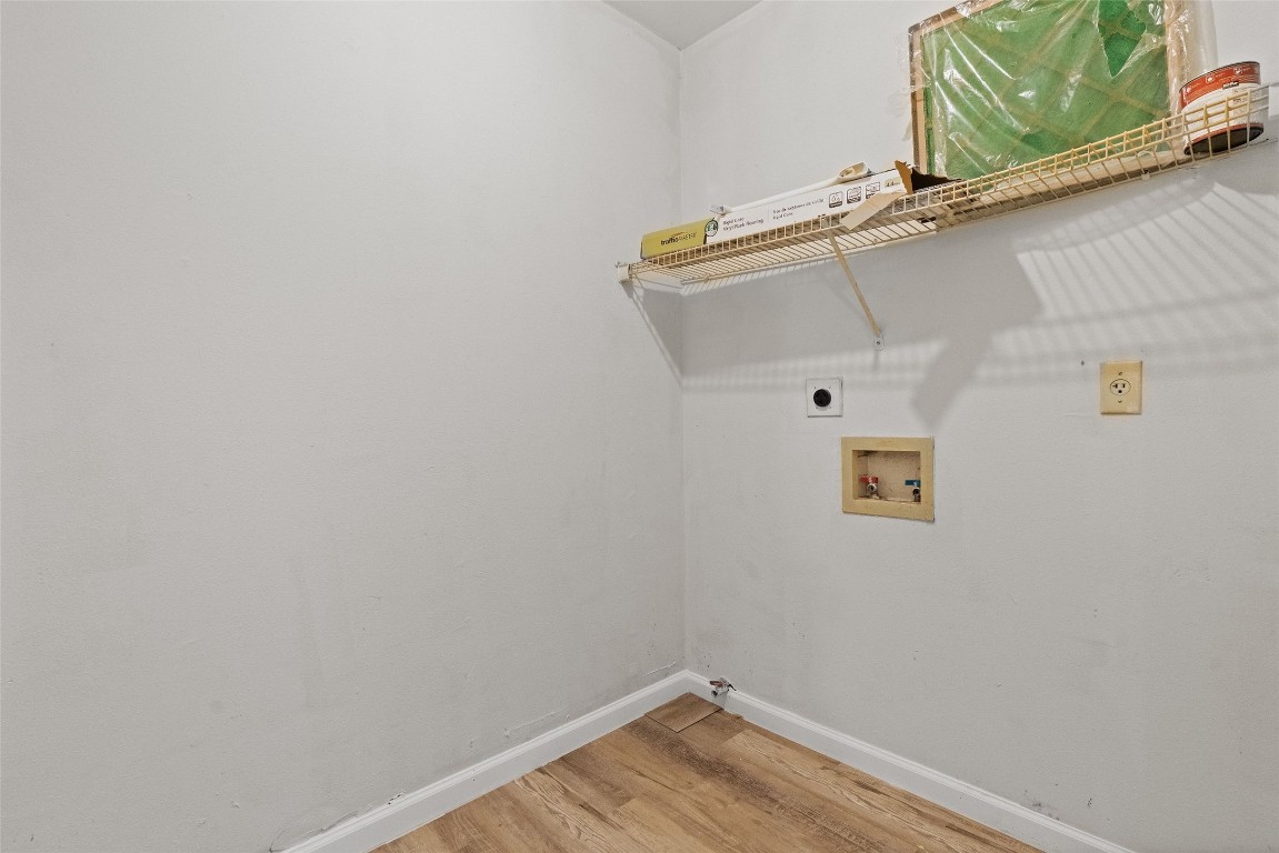 1304 Delano Street, Unit B Austin, TX 78721 - Photo 15 of 15 a view of a room with wooden floor