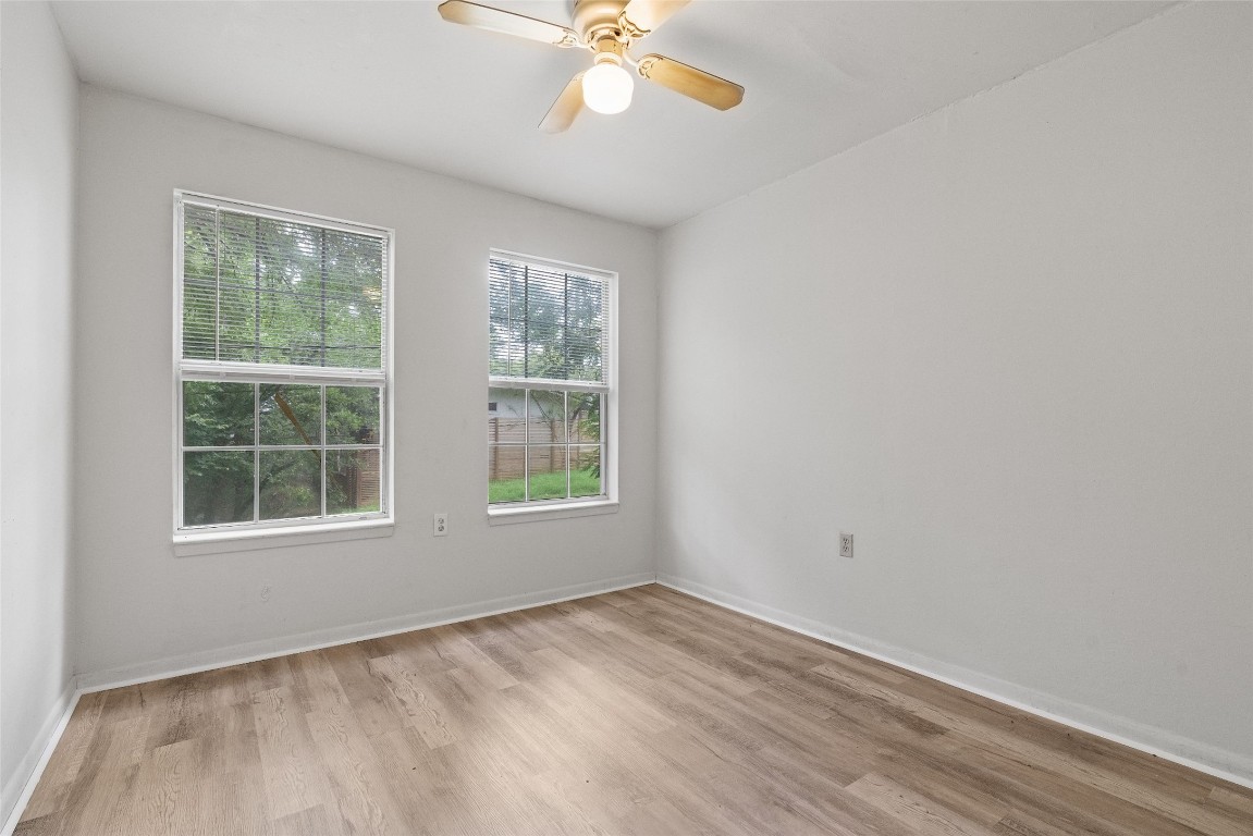 1304 Delano Street, Unit B Austin, TX 78721 - Photo 10 of 15 an empty room with a window