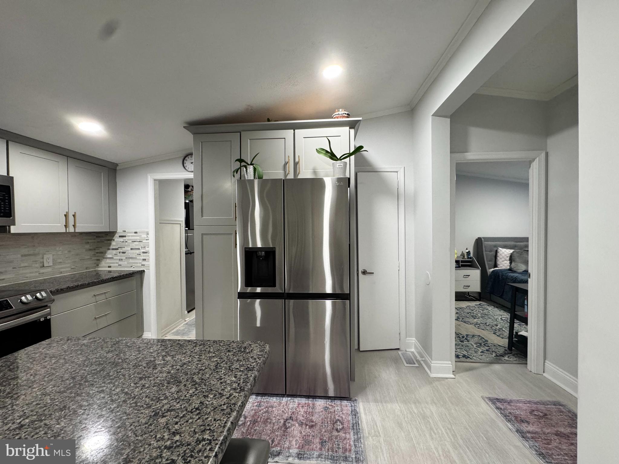 5 Emery Circle Delmar, DE 19940 - Photo 11 of 49 a kitchen with a refrigerator and a sink