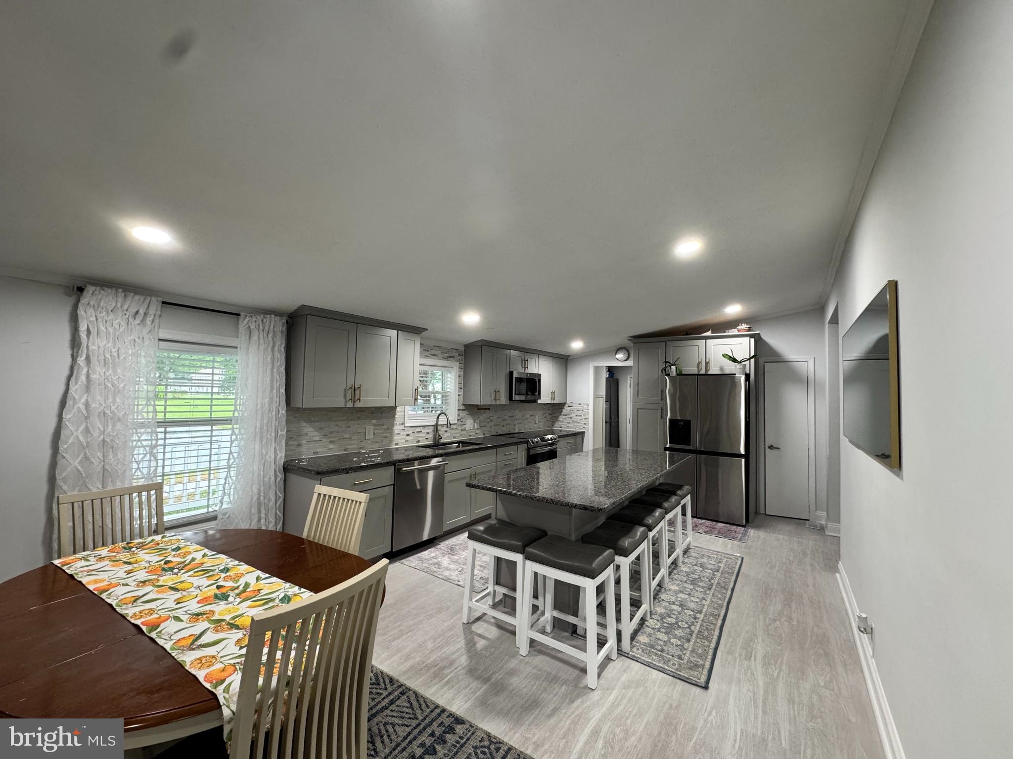 5 Emery Circle Delmar, DE 19940 - Photo 13 of 49 a kitchen with granite countertop lots of counter top space and stainless steel appliances