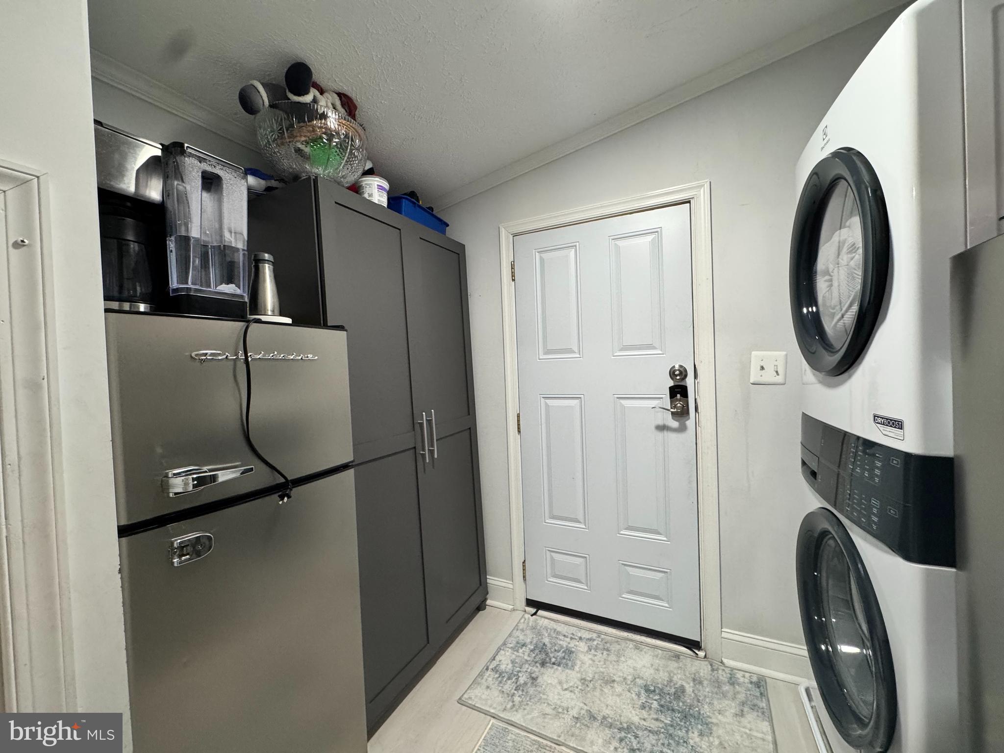 5 Emery Circle Delmar, DE 19940 - Photo 17 of 49 a view of a hallway with washer and dryer