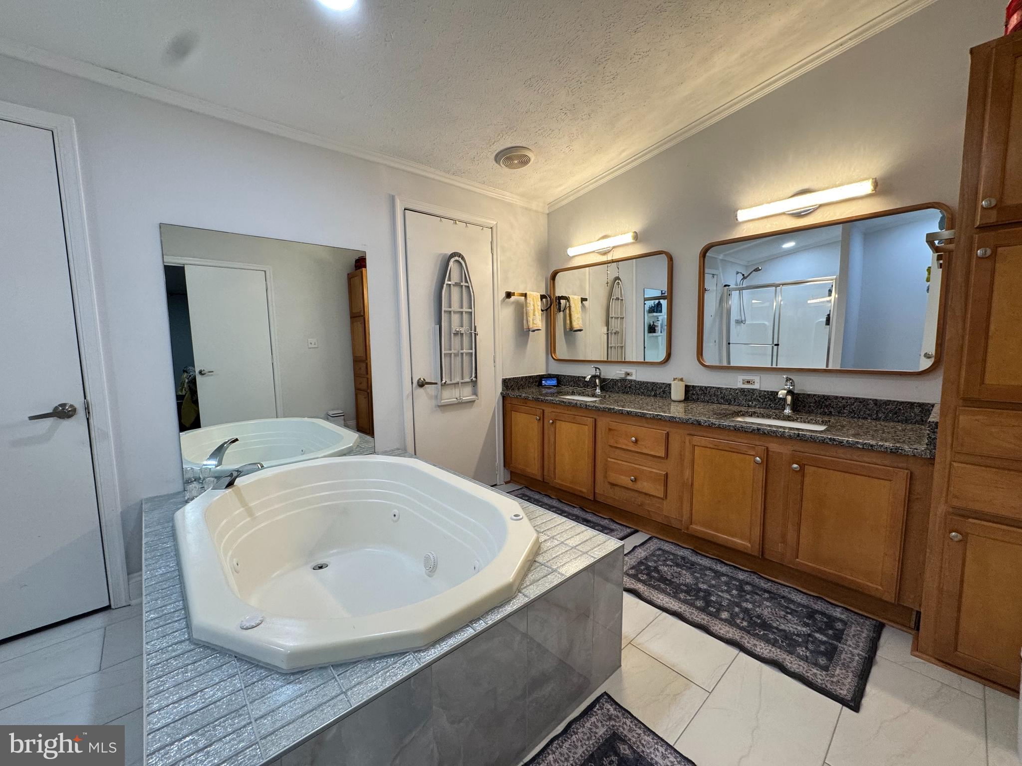 5 Emery Circle Delmar, DE 19940 - Photo 27 of 49 a bathroom with a granite countertop sink and a mirror