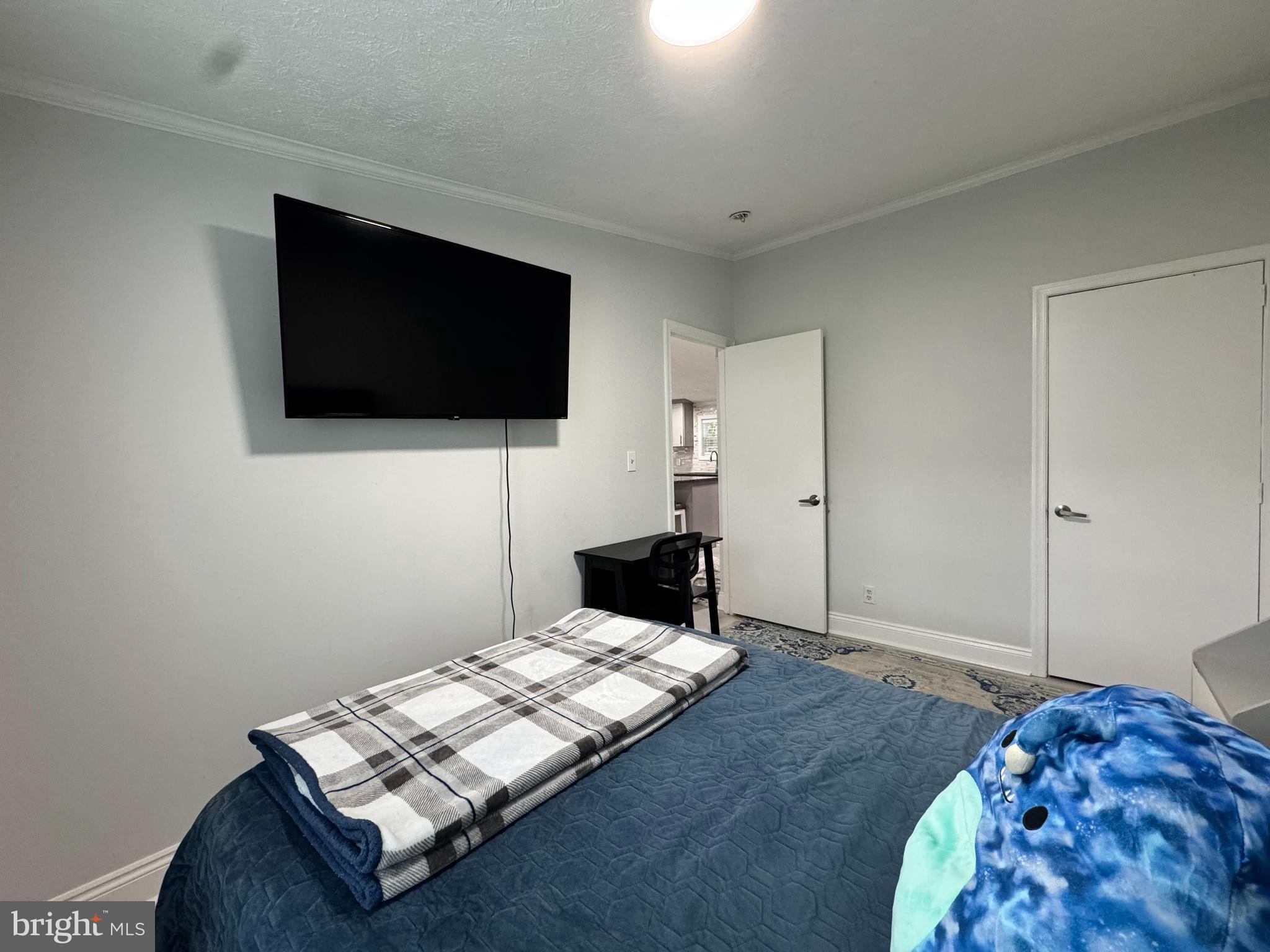 5 Emery Circle Delmar, DE 19940 - Photo 32 of 49 a bedroom with bed and flat screen tv