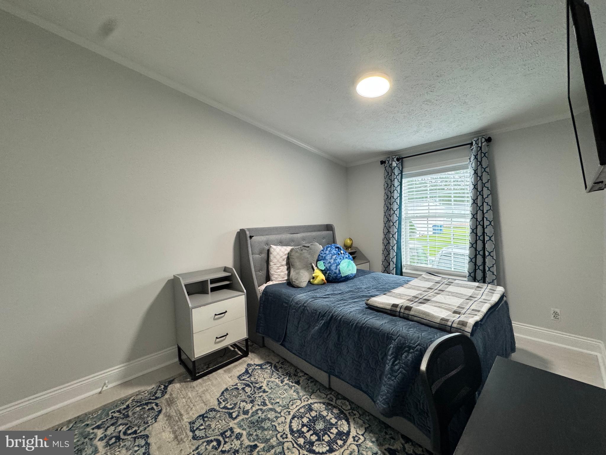 5 Emery Circle Delmar, DE 19940 - Photo 33 of 49 a bedroom with a bed and a window