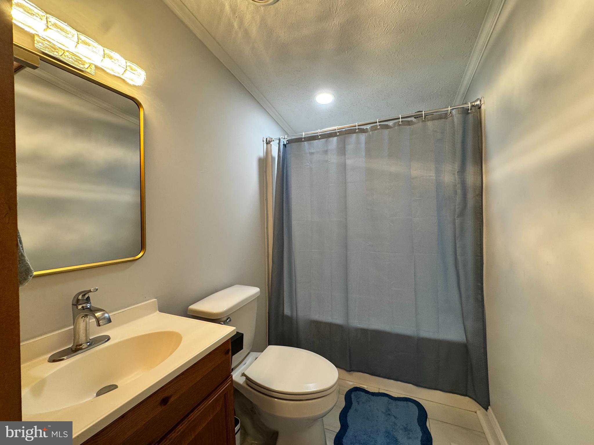 5 Emery Circle Delmar, DE 19940 - Photo 35 of 49 a bathroom with a sink toilet and vanity