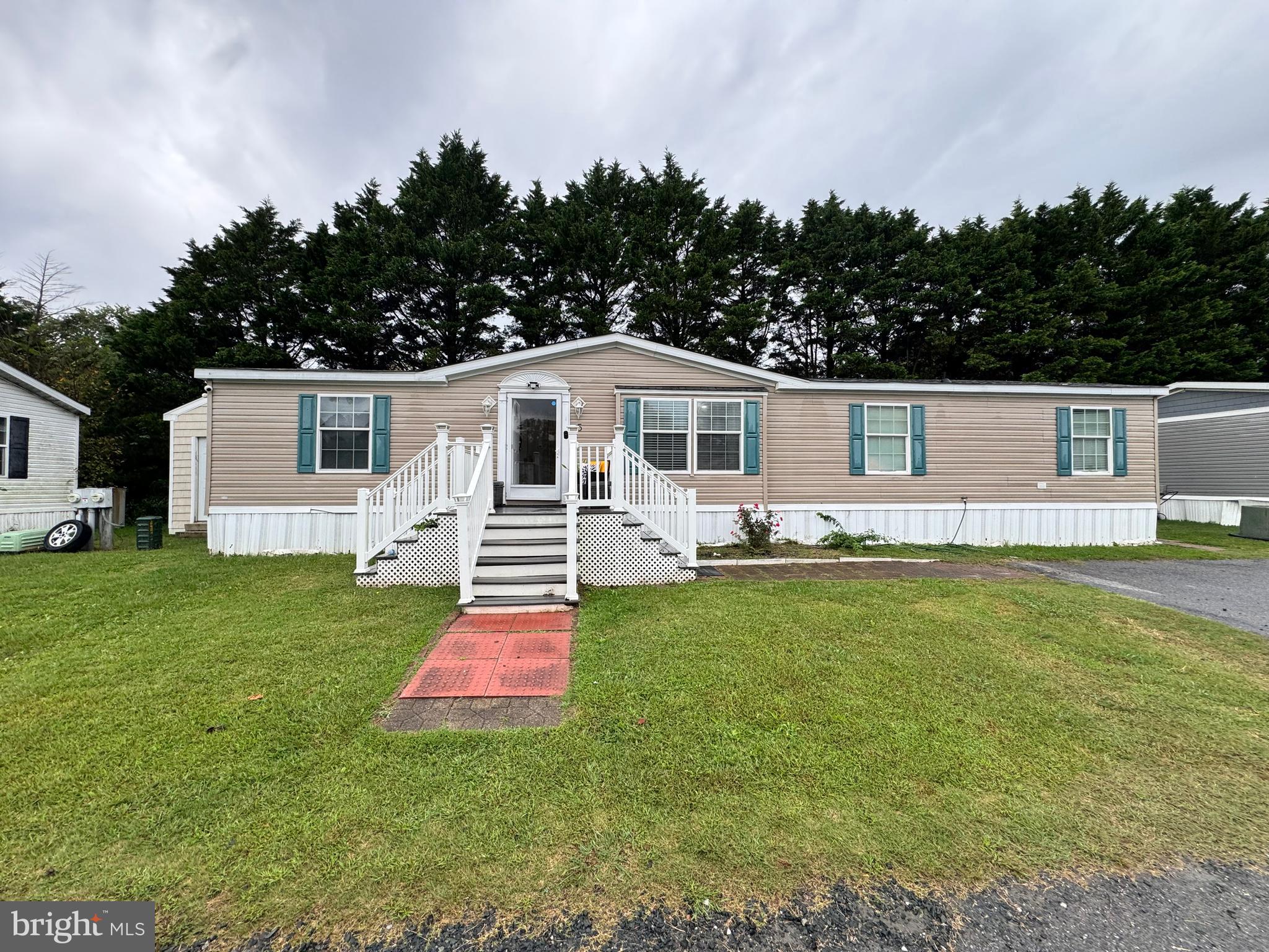 5 Emery Circle Delmar, DE 19940 - Photo 5 of 49 a front view of a house with garden