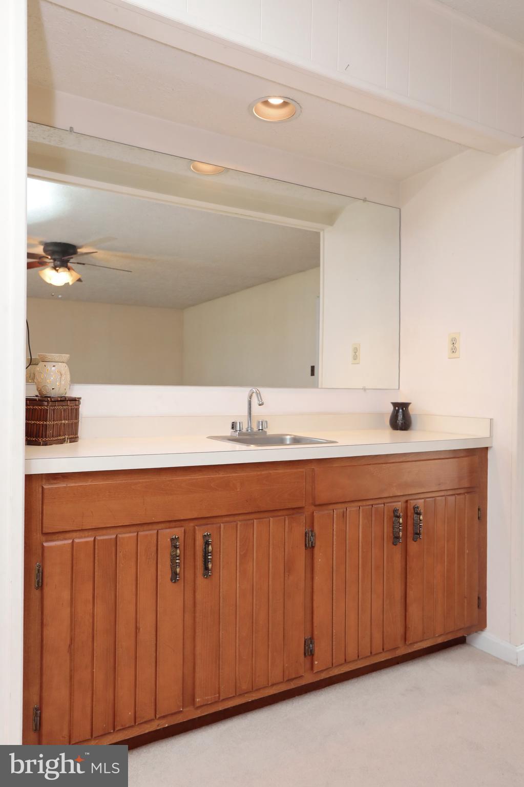 8865 Lowell Road Pomfret, MD 20675 - Photo 31 of 46 Wet bar in family room