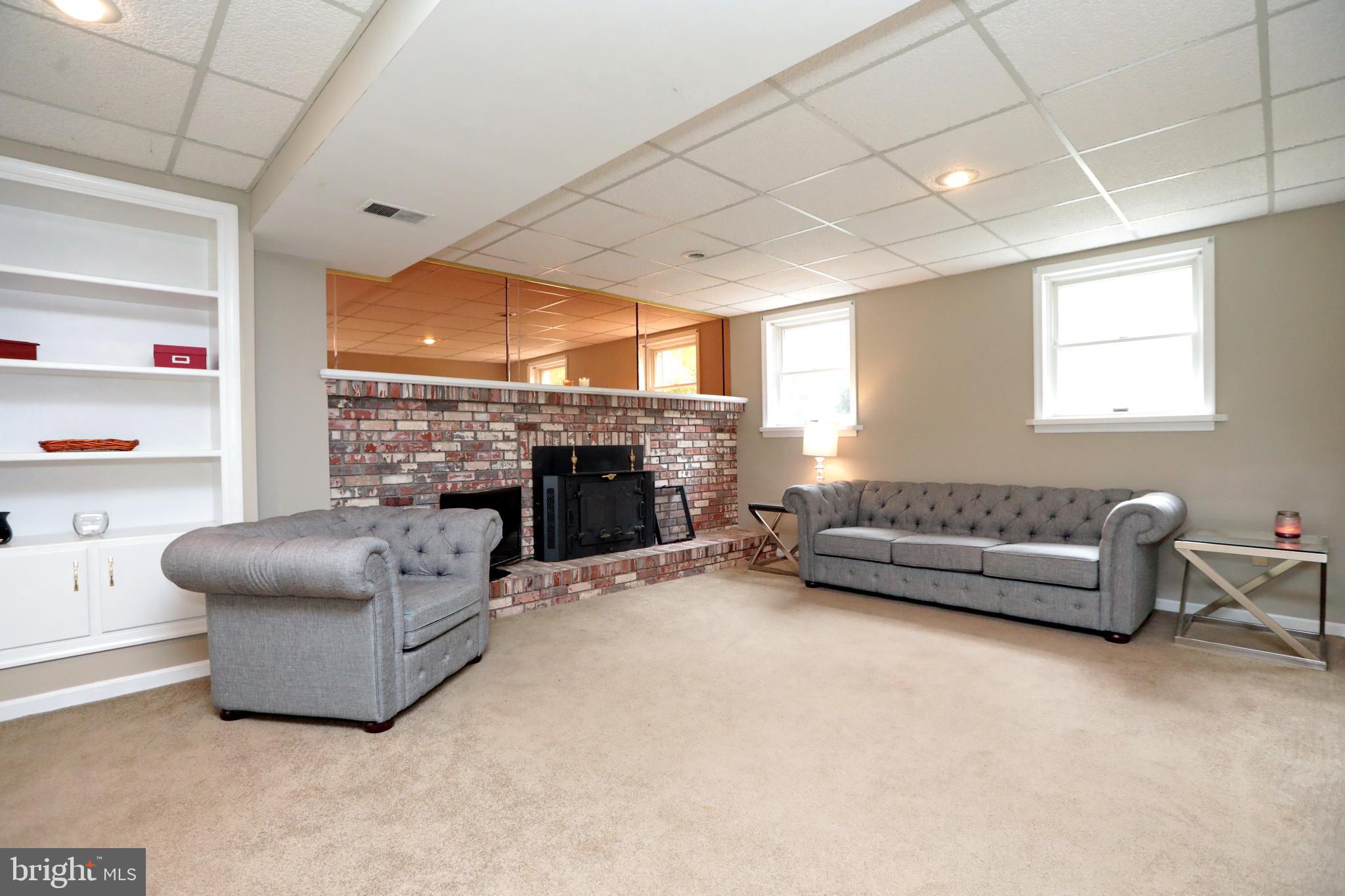 8865 Lowell Road Pomfret, MD 20675 - Photo 40 of 46 Family Room with fireplace, lower level