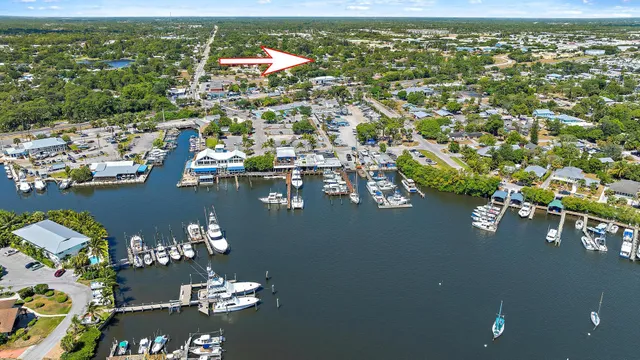 an aerial view of a house with a ocean view