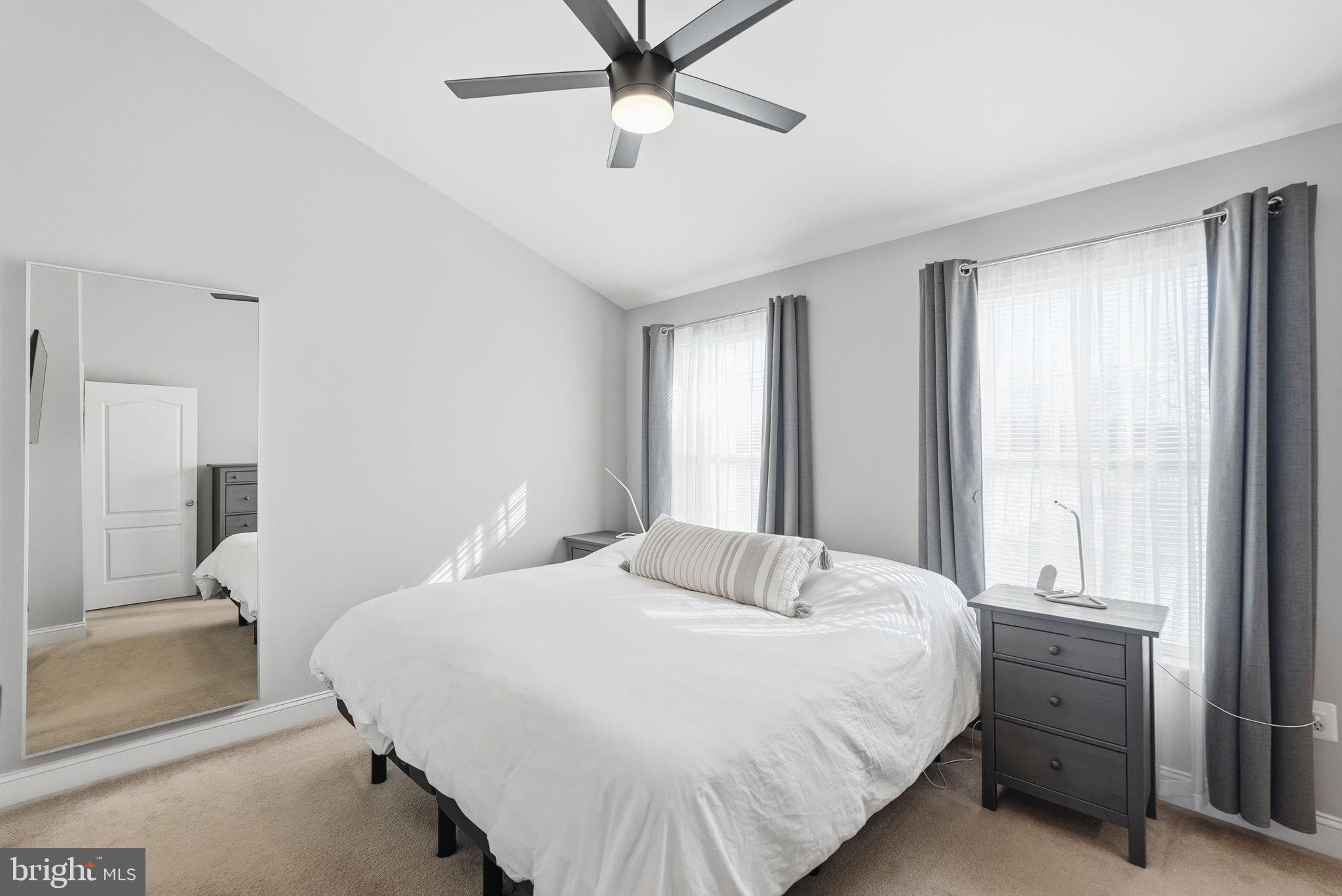 5027 Potomac Highlands Circle Triangle, VA 22172 - Photo 15 of 32 Bright and airy primary bedroom