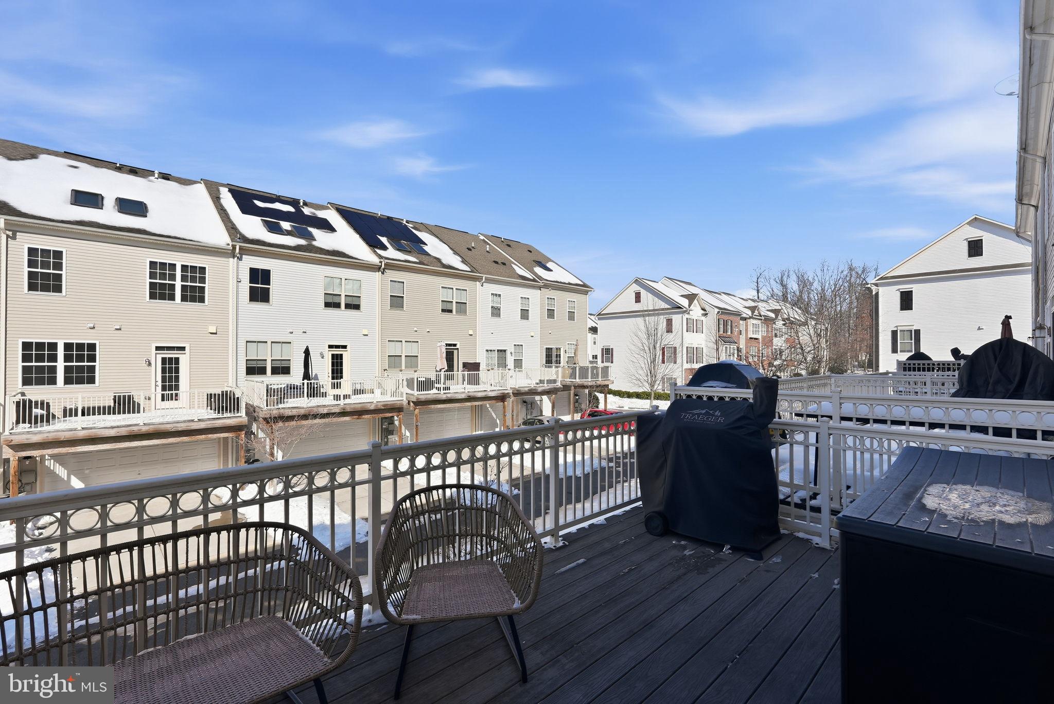 5027 Potomac Highlands Circle Triangle, VA 22172 - Photo 24 of 32 Charming deck with scenic neighborhood views.