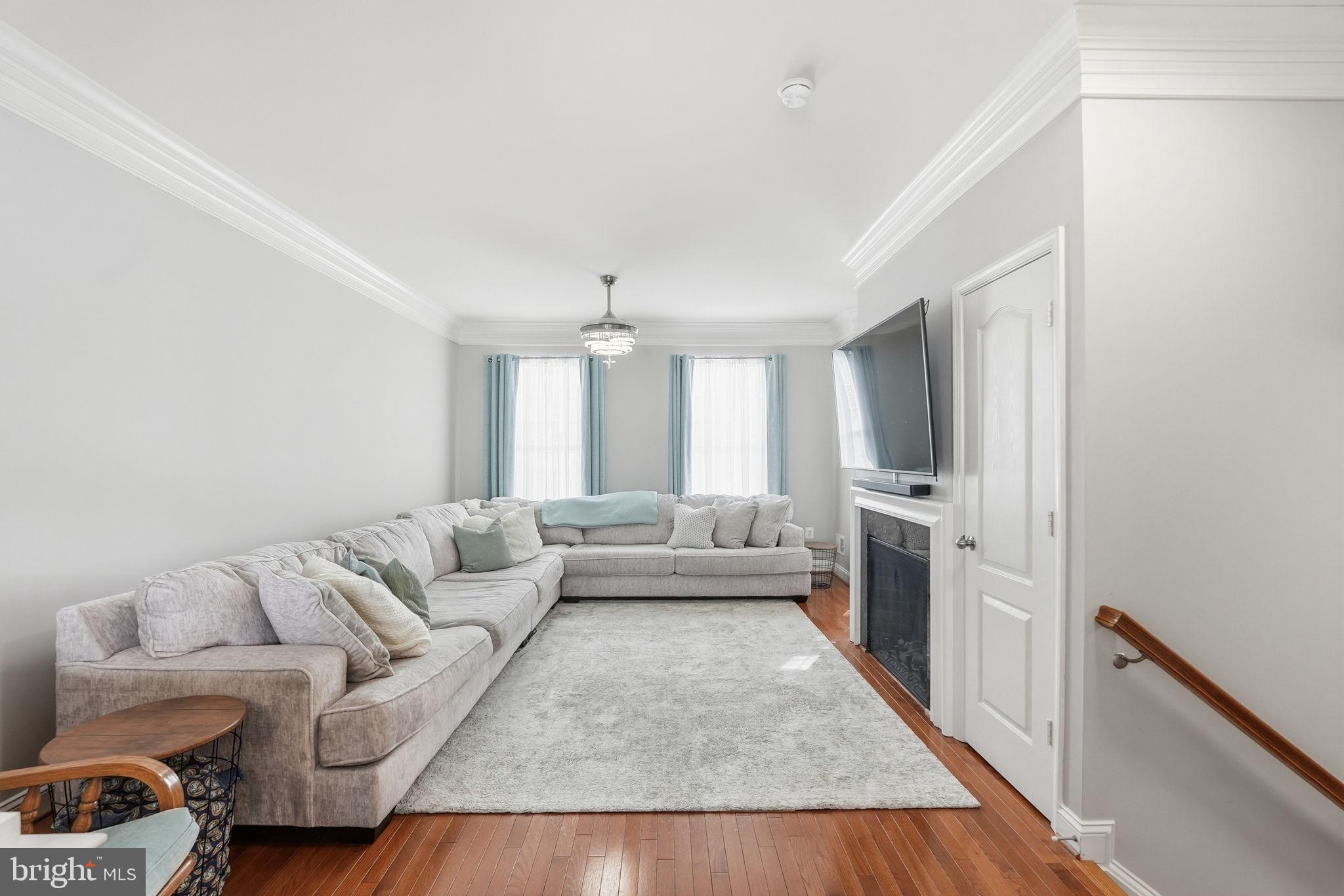 5027 Potomac Highlands Circle Triangle, VA 22172 - Photo 10 of 32 Living room with electric fireplace