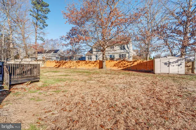 a view of snow on the side of the road