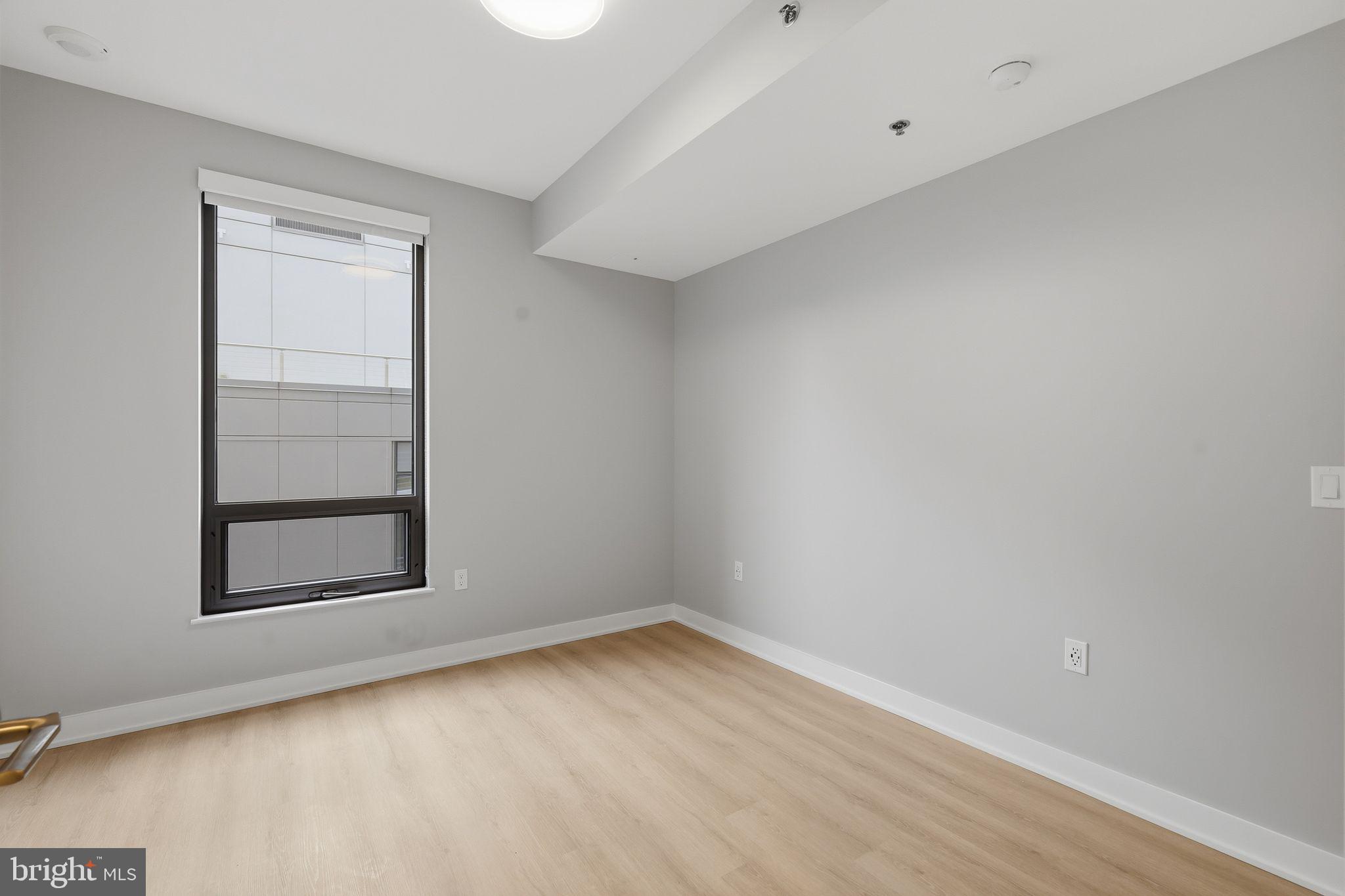 950 3rd Street Northwest, Unit 907 Washington, DC 20001 - Photo 30 of 34 an empty room with a window