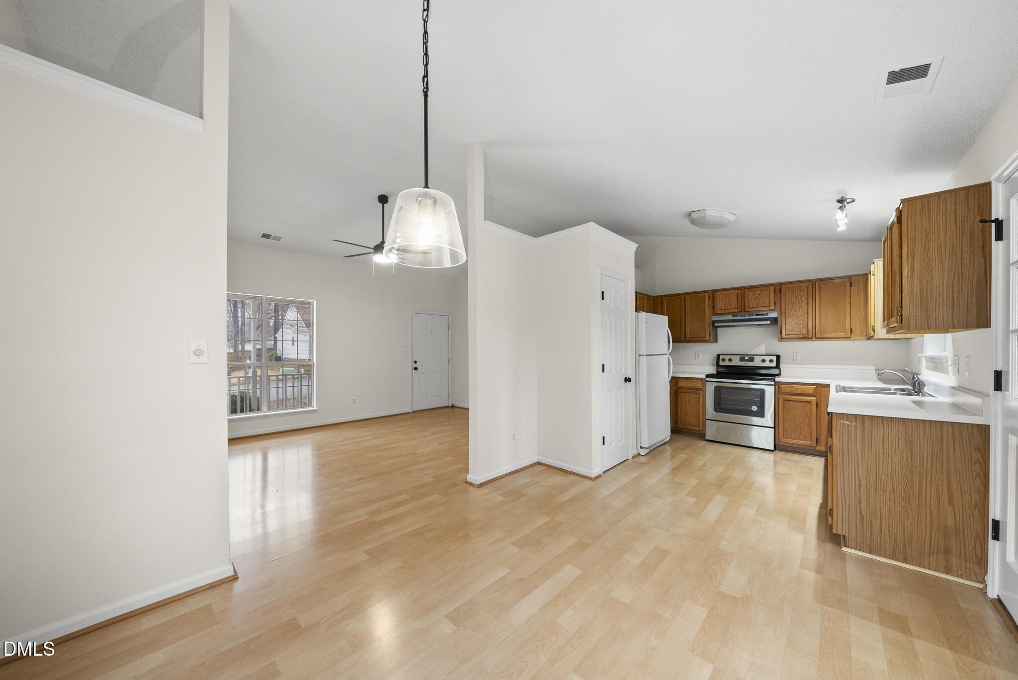 5705 Bashford Crest Lane Raleigh, NC 27606 - Photo 7 of 17 Dining to Kitchen