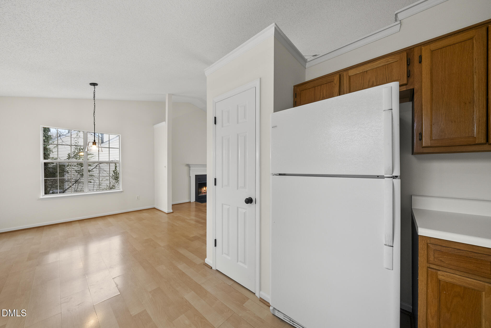 5705 Bashford Crest Lane Raleigh, NC 27606 - Photo 9 of 17 Kitchen to Dining