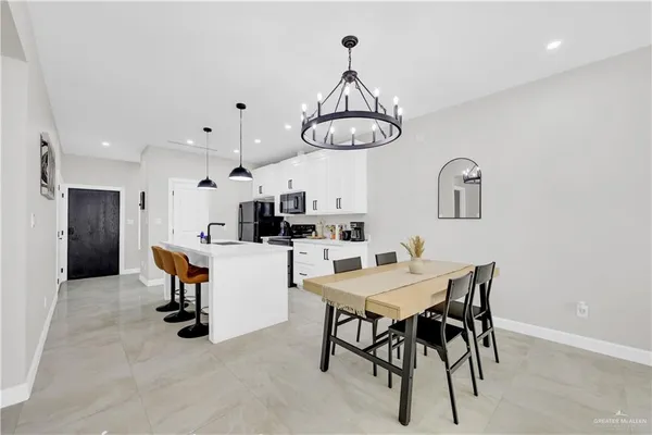 a view of a dining room with furniture
