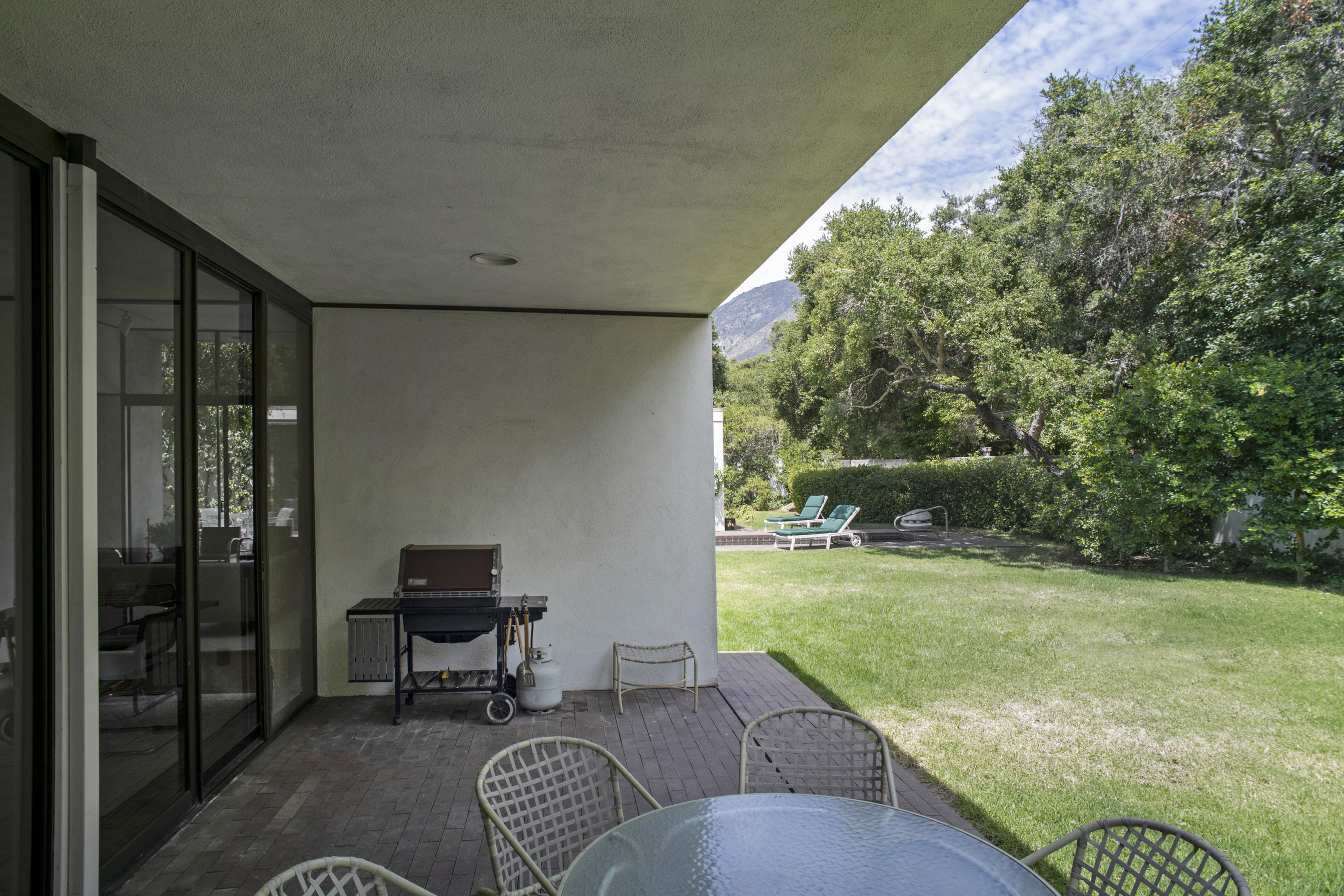Undisclosed Address Montecito, CA 93108 - Photo 11 of 32 a view of backyard with tub and couches