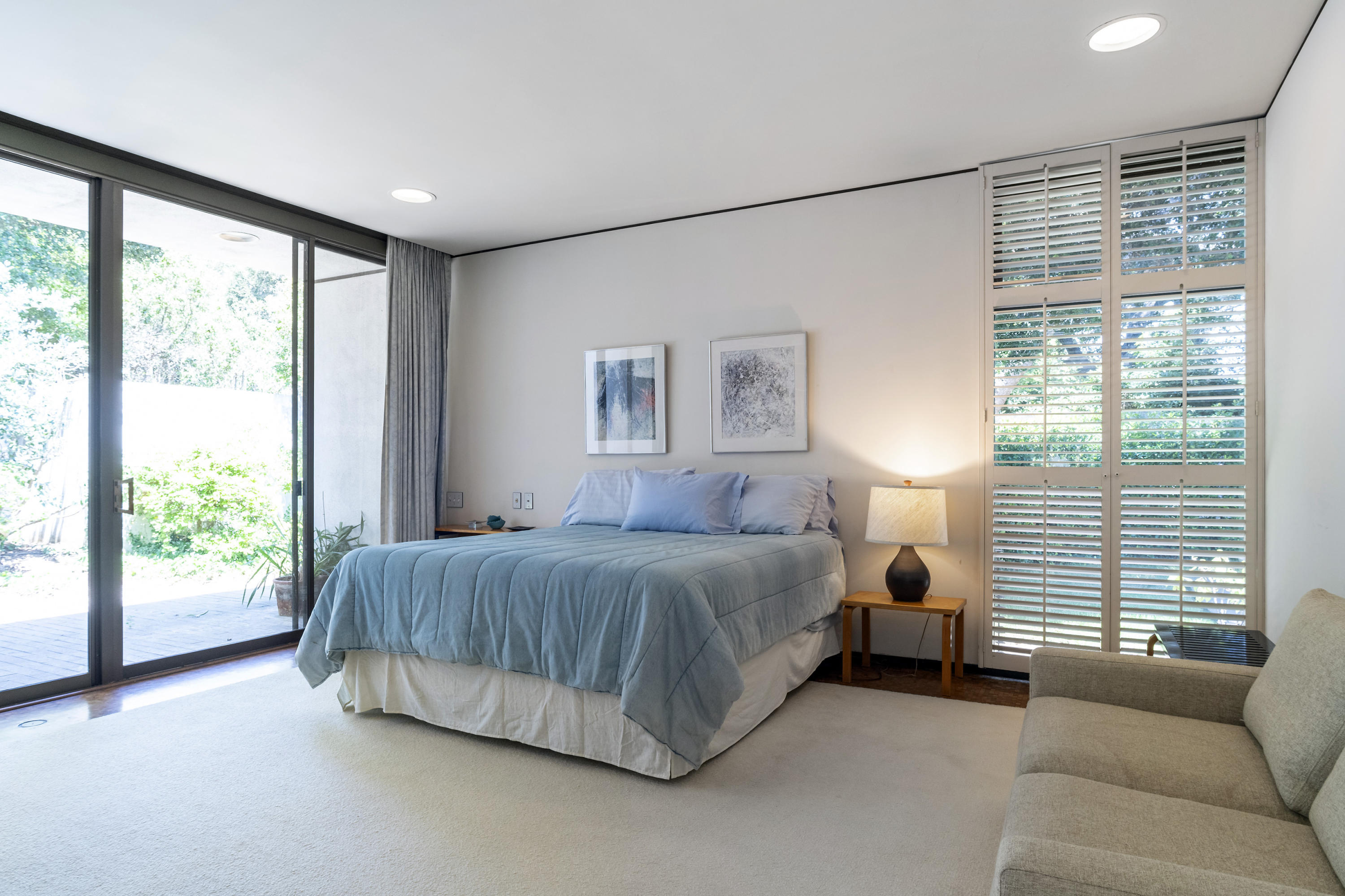 Undisclosed Address Montecito, CA 93108 - Photo 22 of 32 a spacious bedroom with a bed and glass window