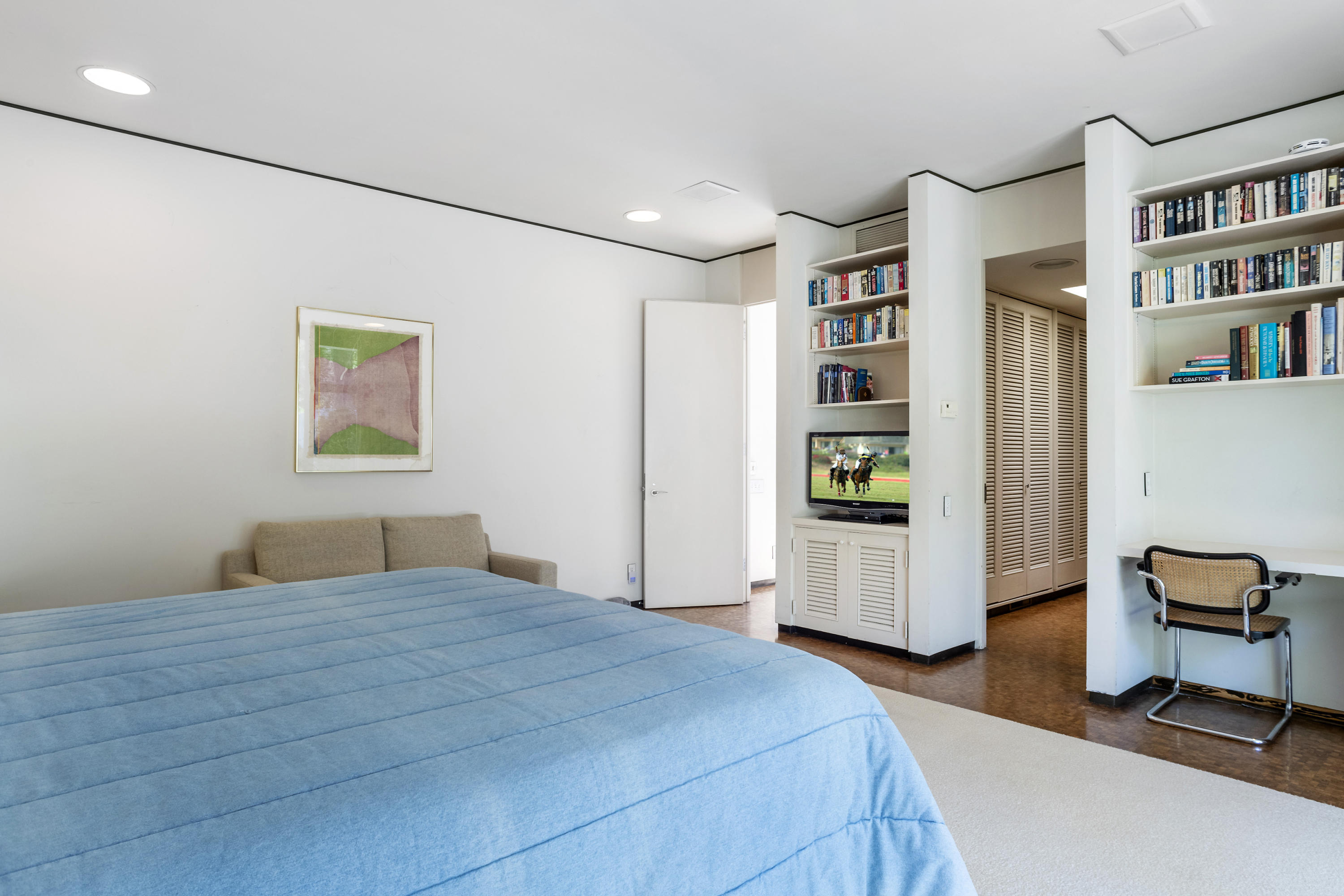 Undisclosed Address Montecito, CA 93108 - Photo 23 of 32 a bedroom with a bed and a book shelf