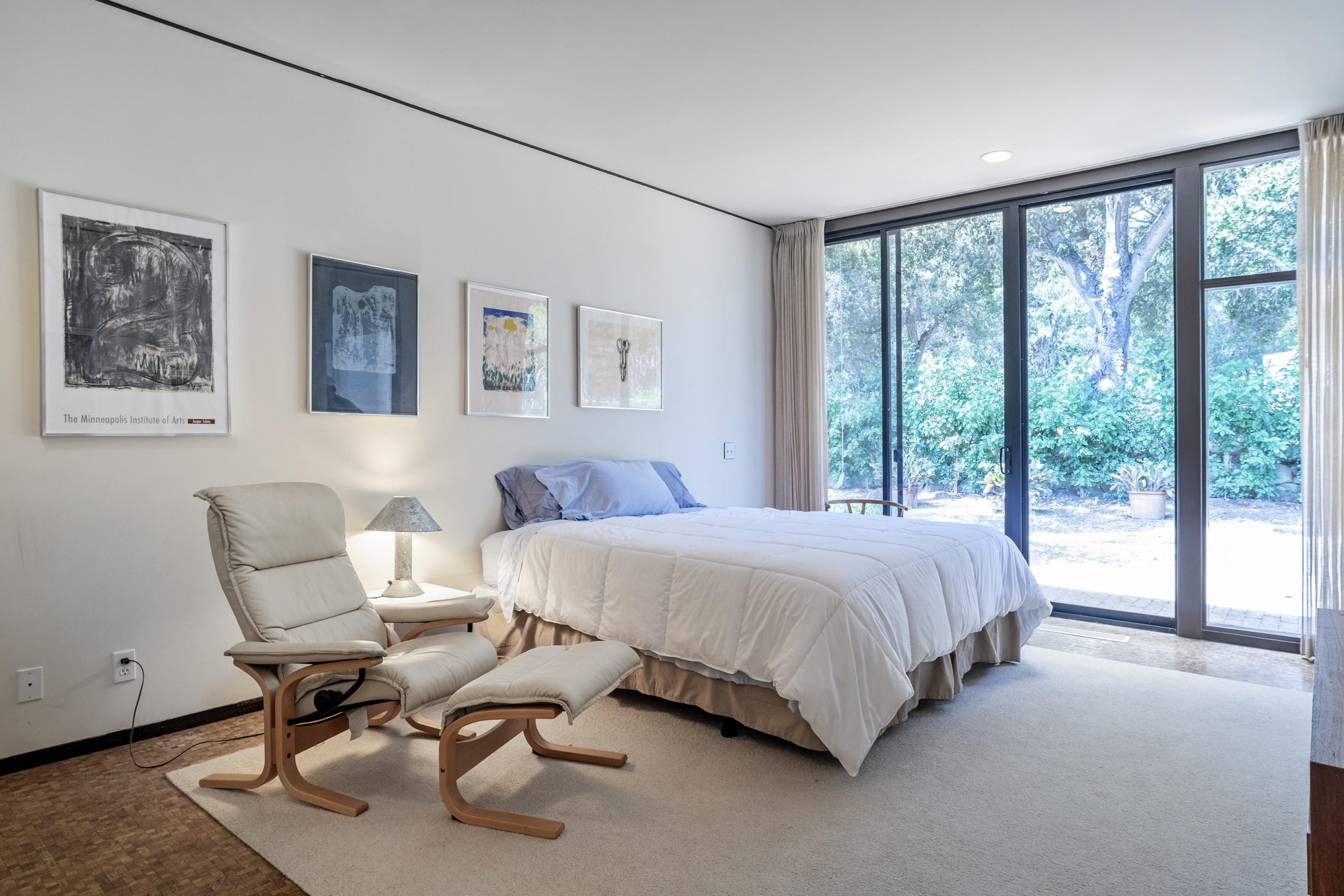 Undisclosed Address Montecito, CA 93108 - Photo 27 of 32 a bed room with a bed and a chair