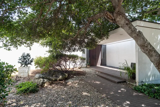 a house view with a outdoor space