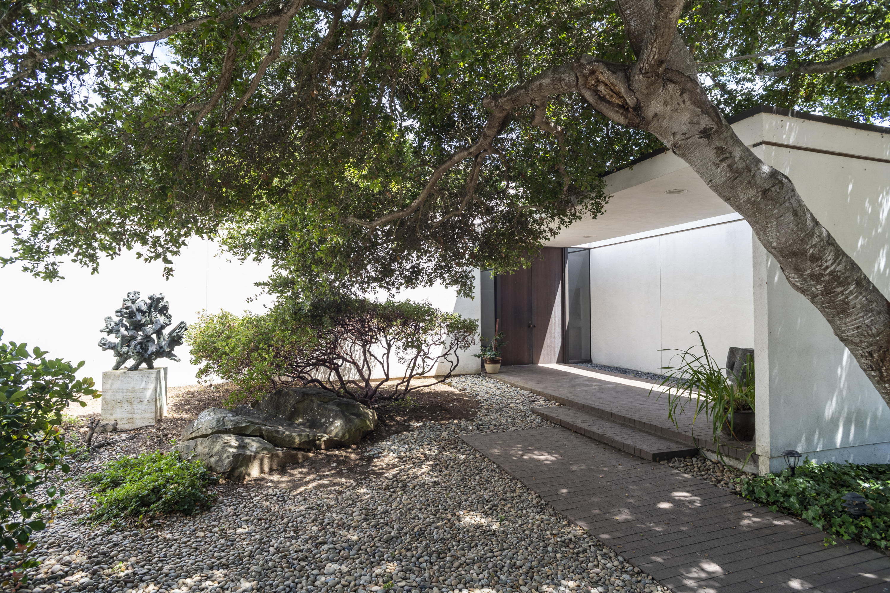 Undisclosed Address Montecito, CA 93108 - Photo 4 of 32 a backyard of a house with lots of green space