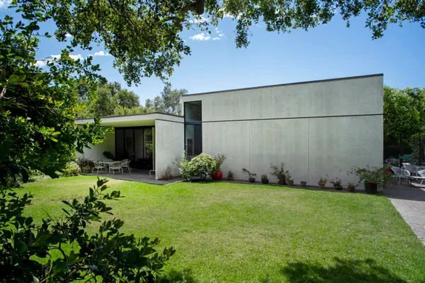 a backyard of a house with lots of green space
