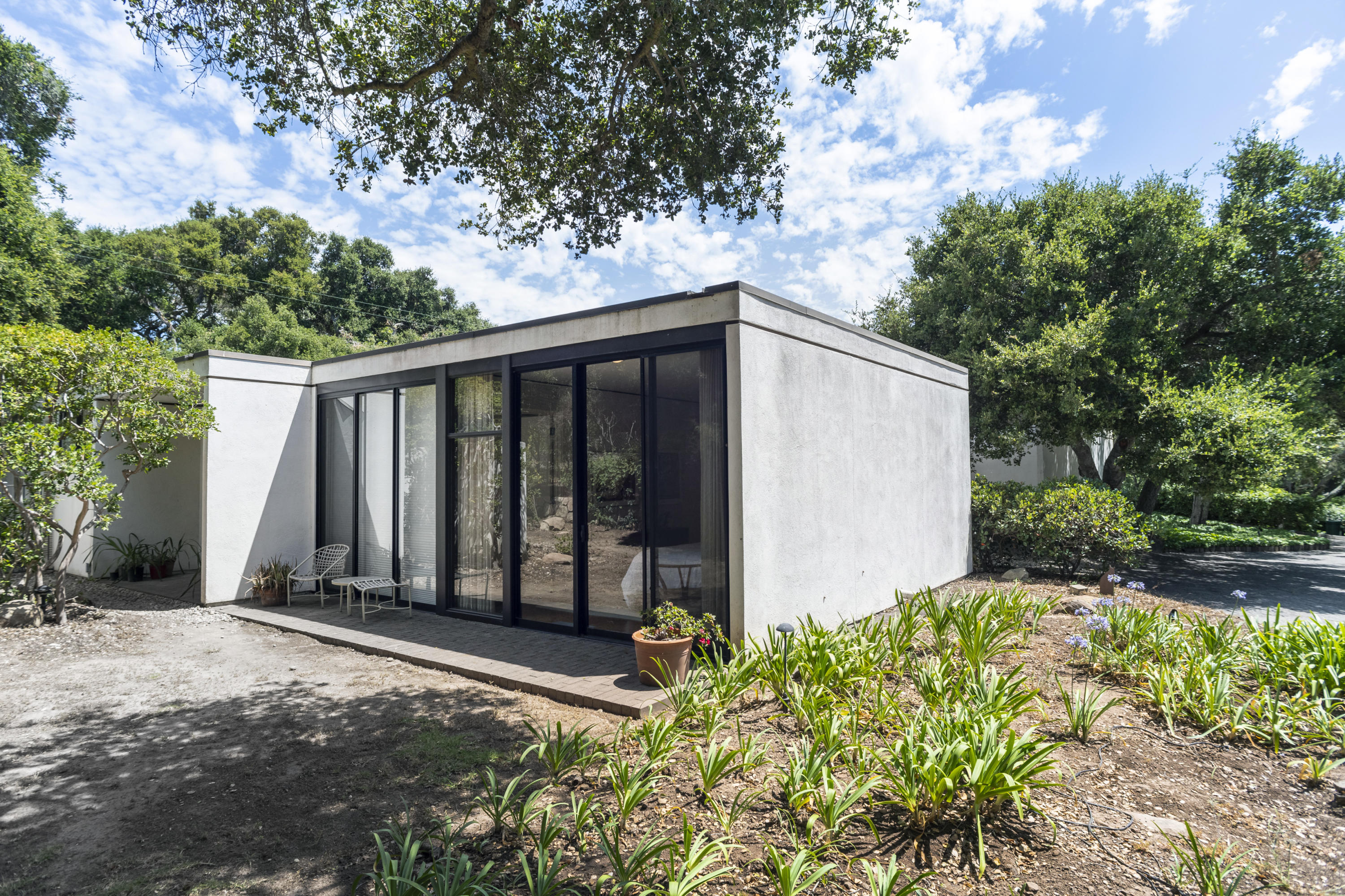 Undisclosed Address Montecito, CA 93108 - Photo 7 of 32 a backyard of a house with lots of green space