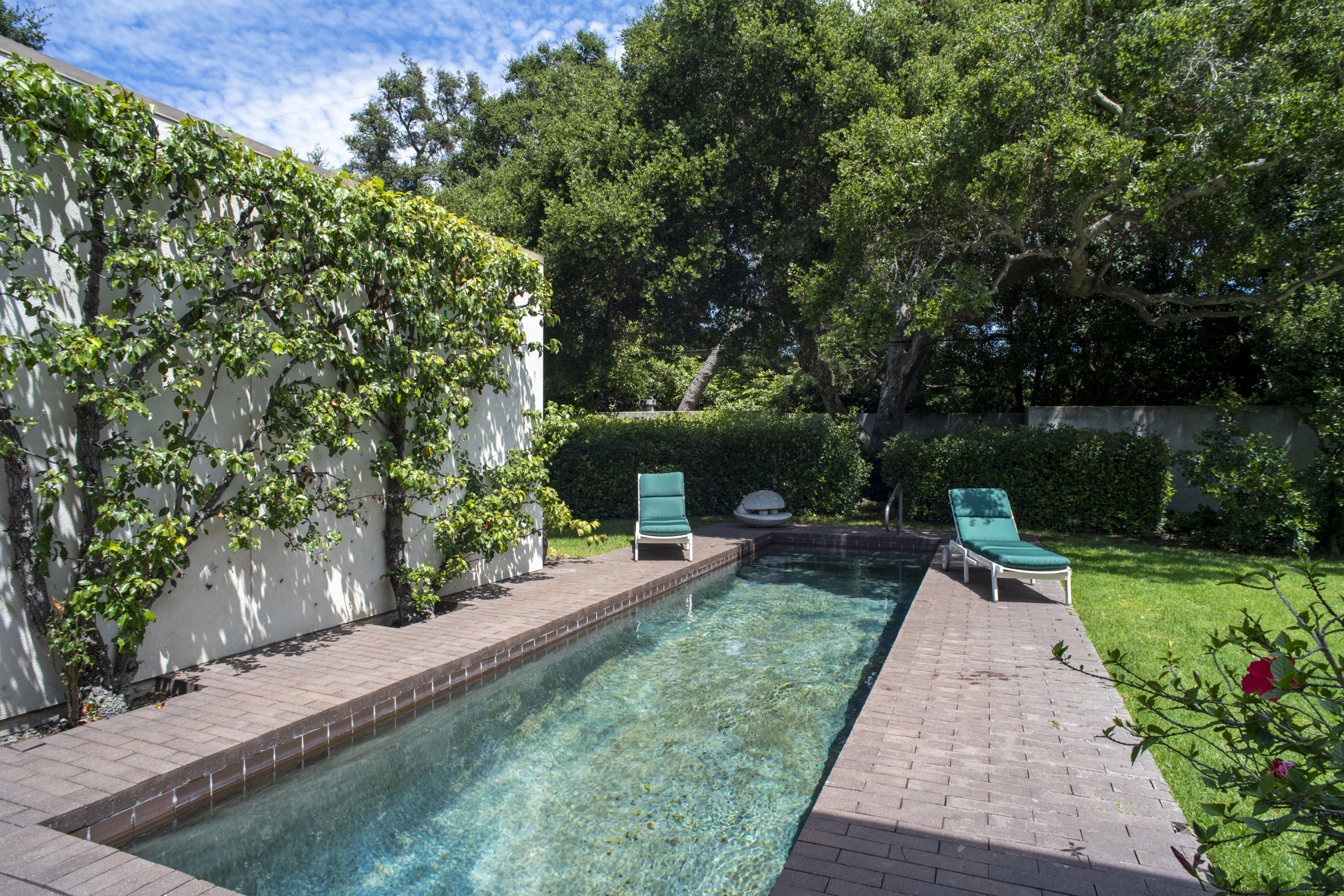 Undisclosed Address Montecito, CA 93108 - Photo 9 of 32 a view of a backyard with sitting area