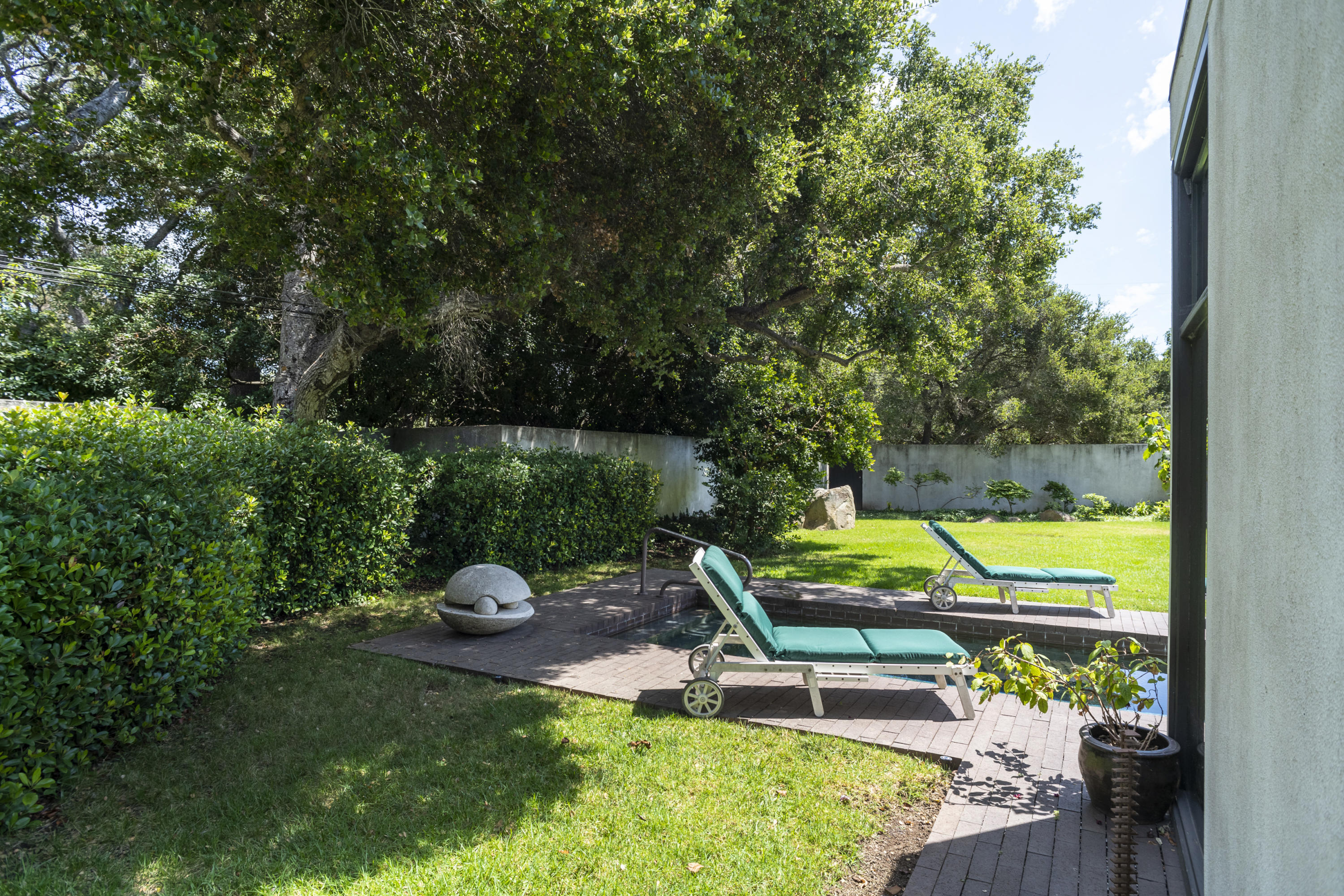 Undisclosed Address Montecito, CA 93108 - Photo 10 of 32 a view of a swimming pool with a patio and a backyard