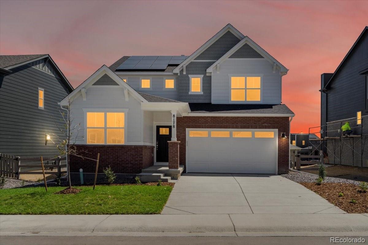 8178 Mount Harvard Road Littleton, CO 80125 - Photo 1 of 39 a front view of a house with yard