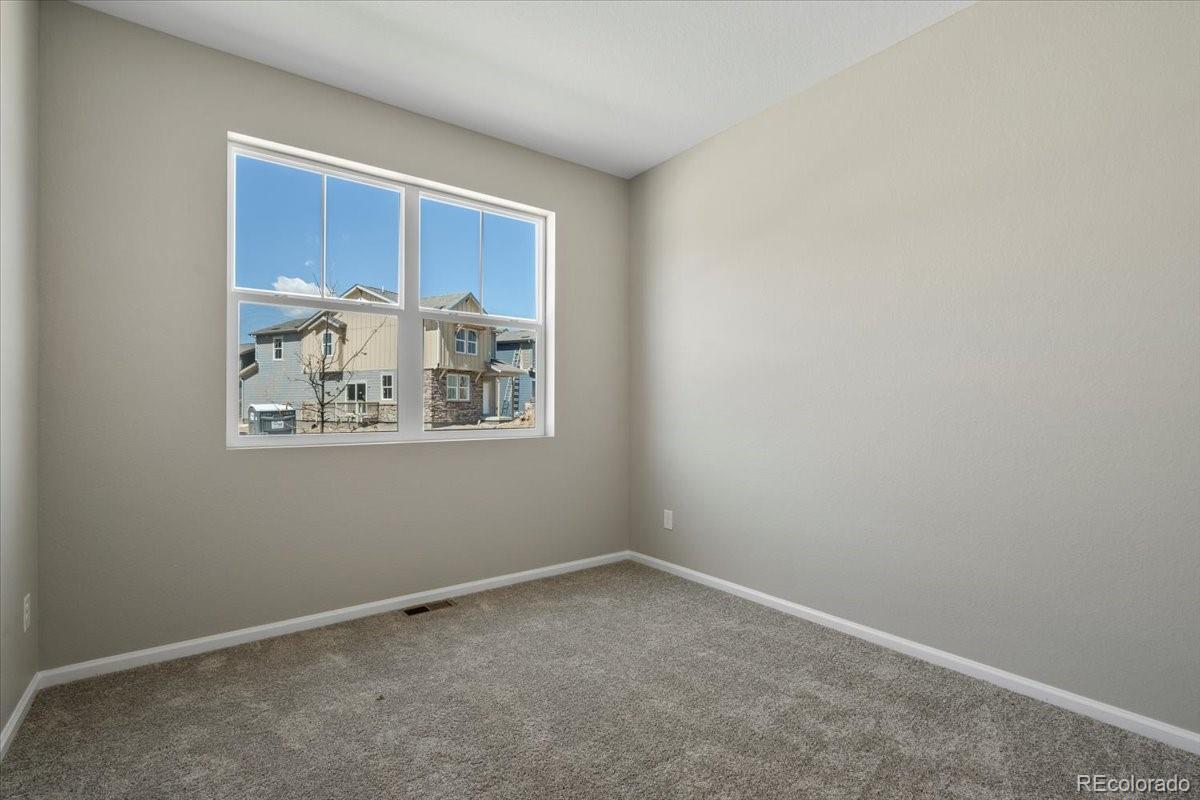 8178 Mount Harvard Road Littleton, CO 80125 - Photo 33 of 39 a view of an empty room with closet