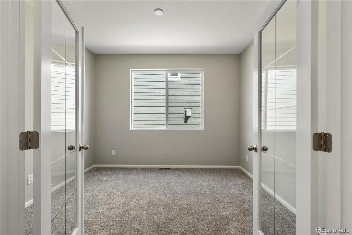 8178 Mount Harvard Road Littleton, CO 80125 - Photo 35 of 39 a view of a room with a window