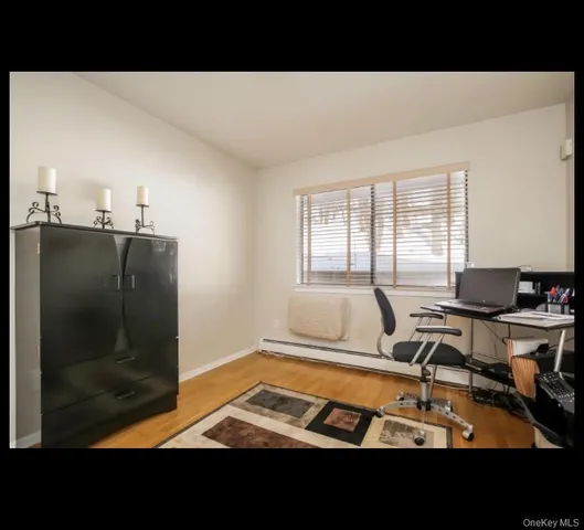 a black and white photo of a living room