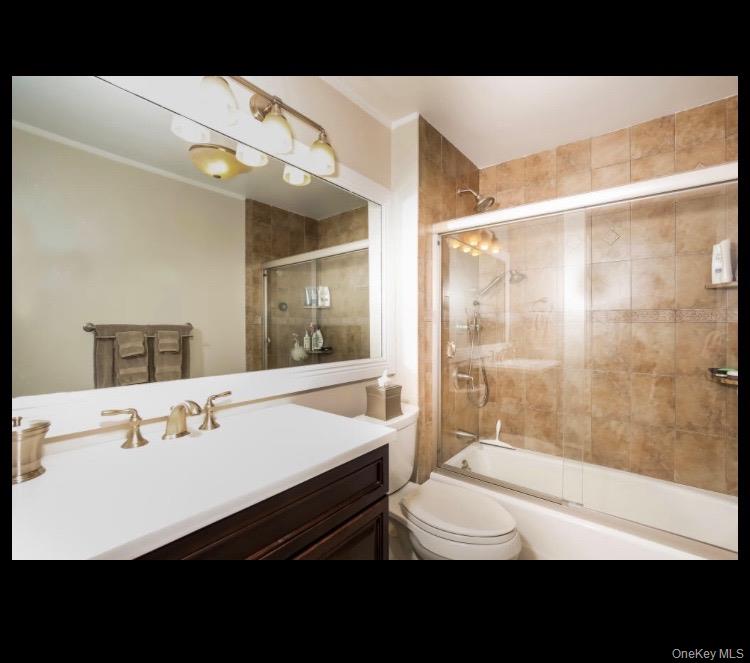 21 Hillside Terrace, Unit C White Plains, NY 10601 - Photo 10 of 18 Full bathroom featuring combined bath / shower with glass door, vanity