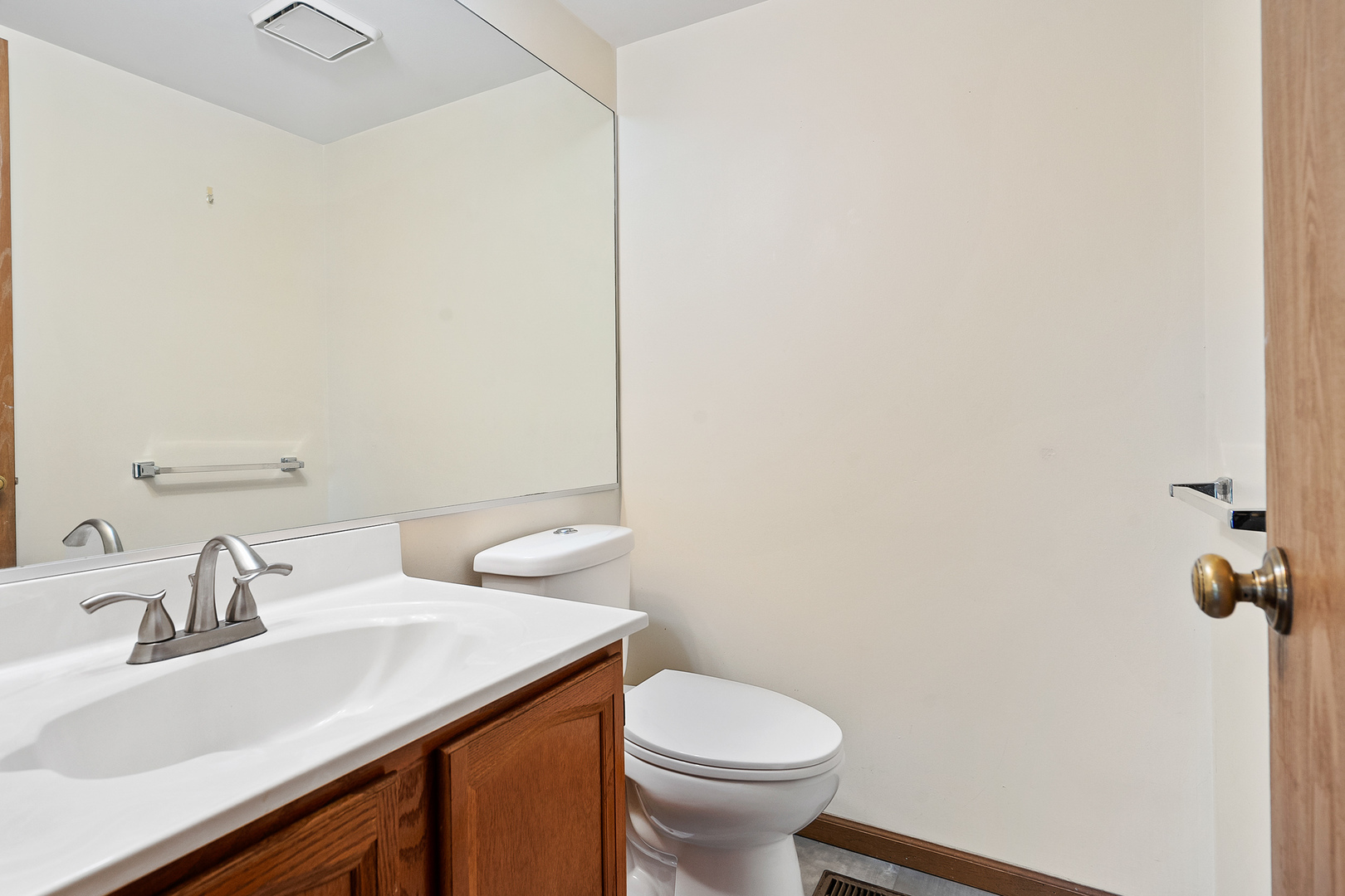 1404 West Sapphire Drive Hoffman Estates, IL 60192 - Photo 13 of 29 a bathroom with a sink and a toilet