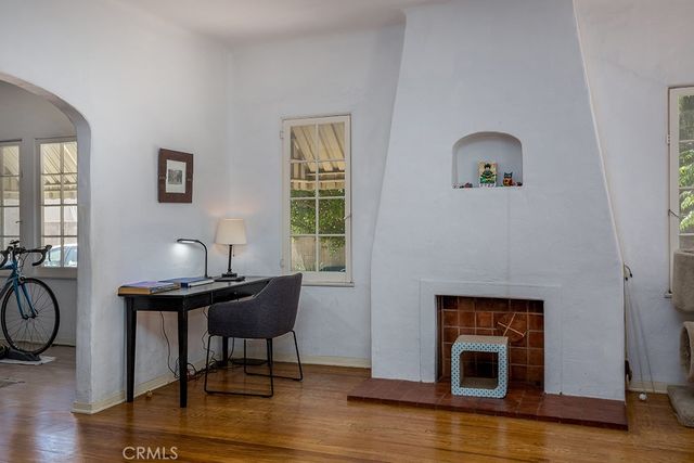 a view of a livingroom with furniture and front door