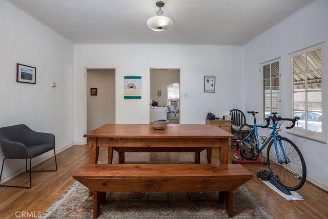 a view of a livingroom with furniture and a window
