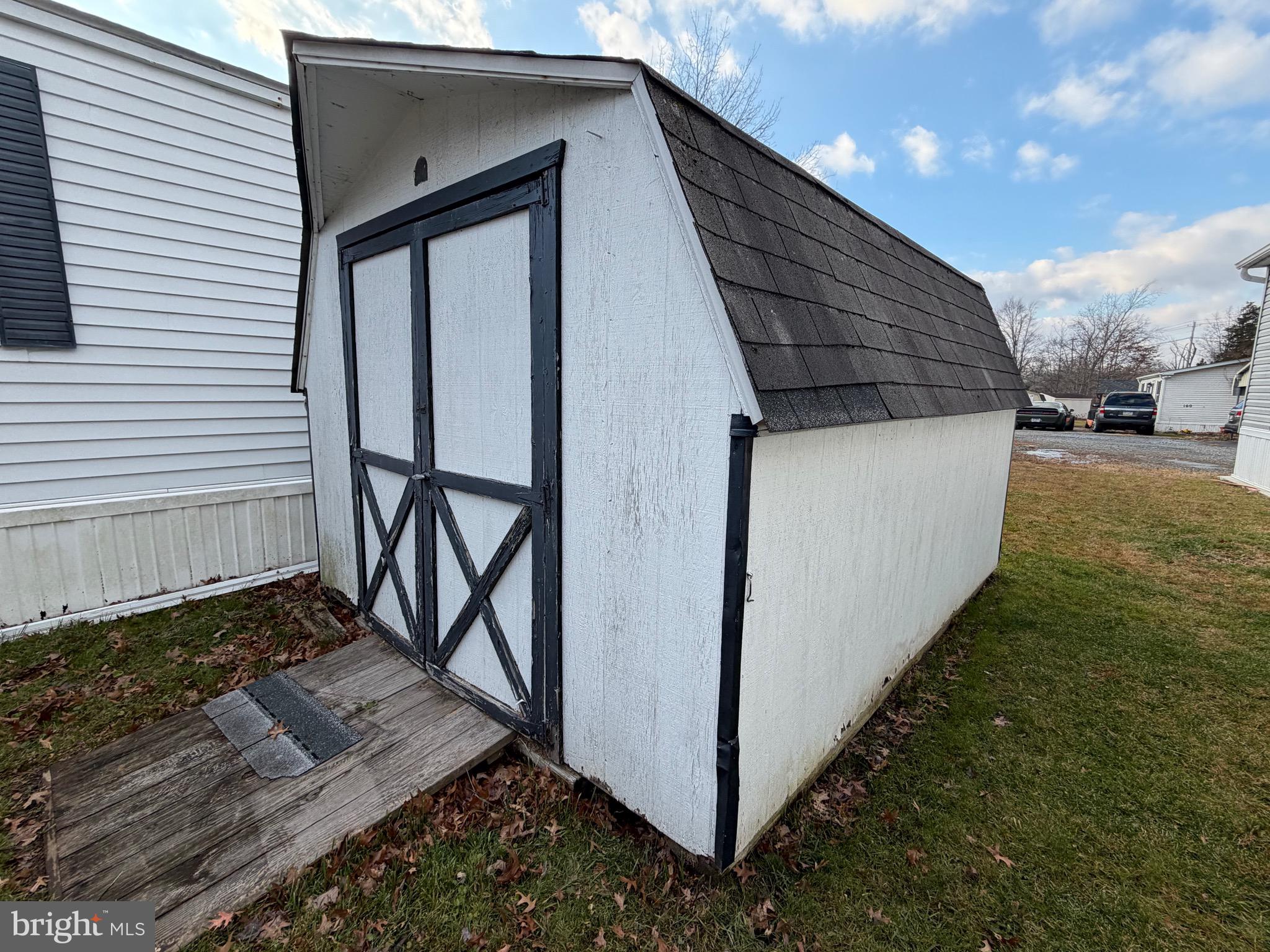 232 Yankee Road, Unit 156 Quakertown, PA 18951 - Photo 4 of 12 a view of backyard with cabin