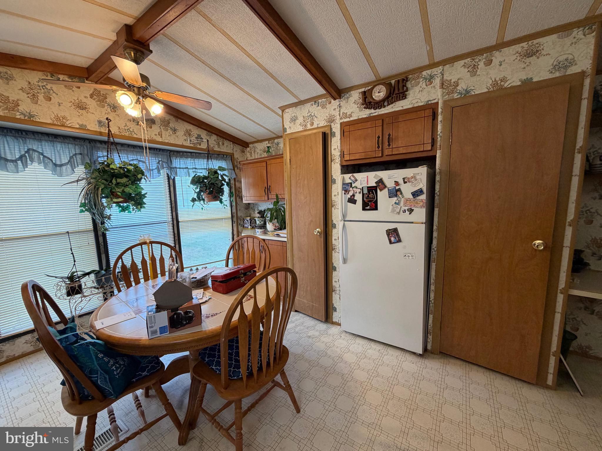 232 Yankee Road, Unit 156 Quakertown, PA 18951 - Photo 7 of 12 a view of a table and chairs in patio