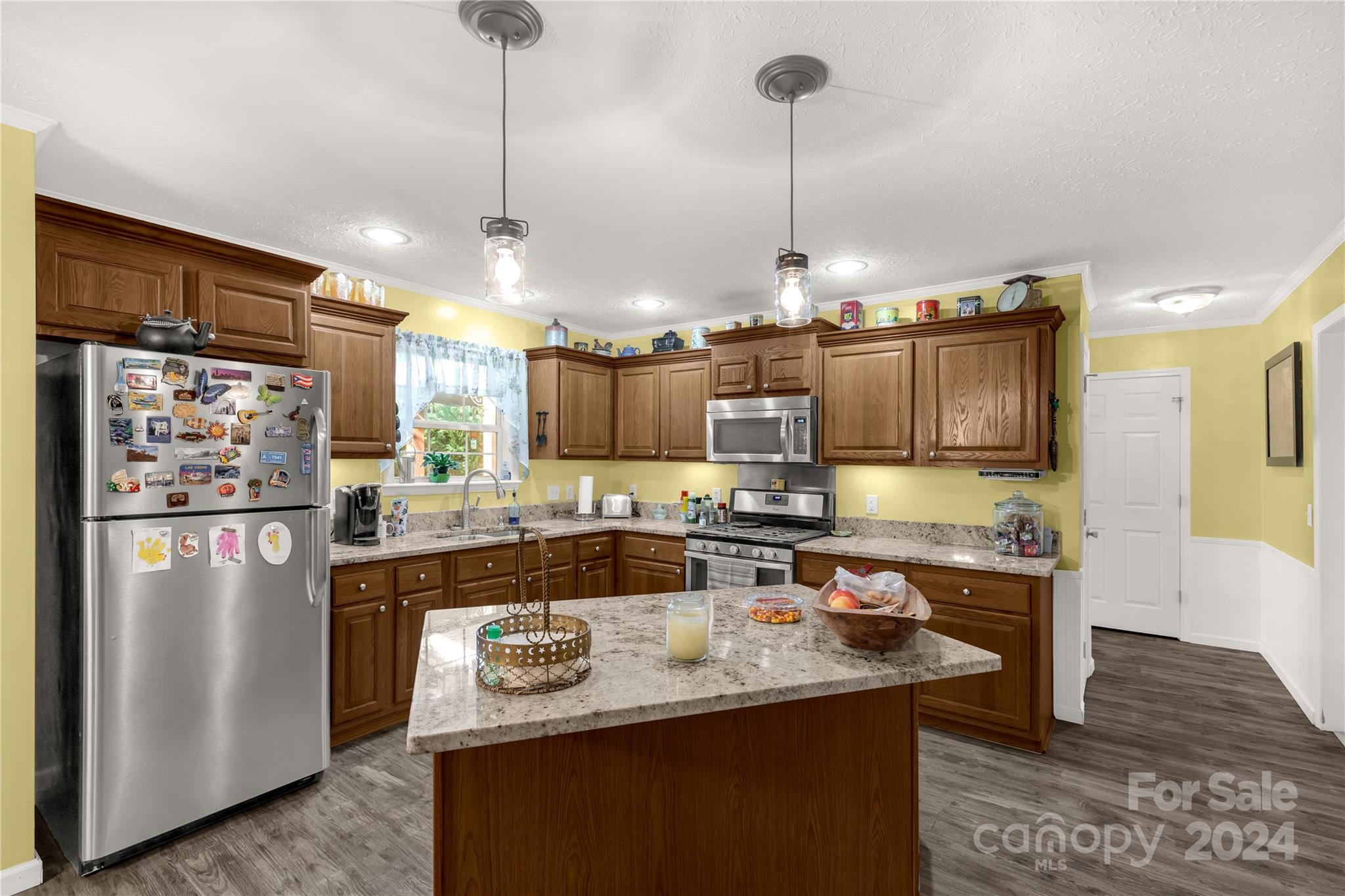 4677 Ramsey Road Sharon, SC 29742 - Photo 8 of 45 a kitchen with stainless steel appliances granite countertop a sink a stove a refrigerator and island